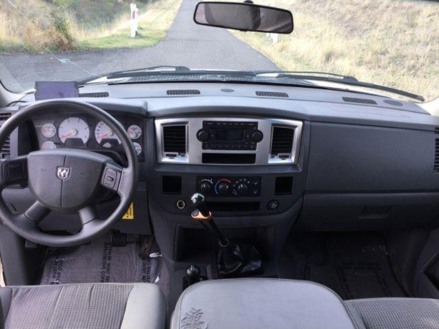 2007 Bright White /Medium Slate Gray Cloth Interior Dodge Ram 2500 SLT Quad Cab LWB 4WD (3D7KS28C37G) with an 5.9L L6 OHV 24V TURBO DIESEL engine, 6-Speed Manual transmission, located at 1801 Main Street, Lewiston, 83501, (208) 743-9371, 46.417065, -117.004799 - Photo#6