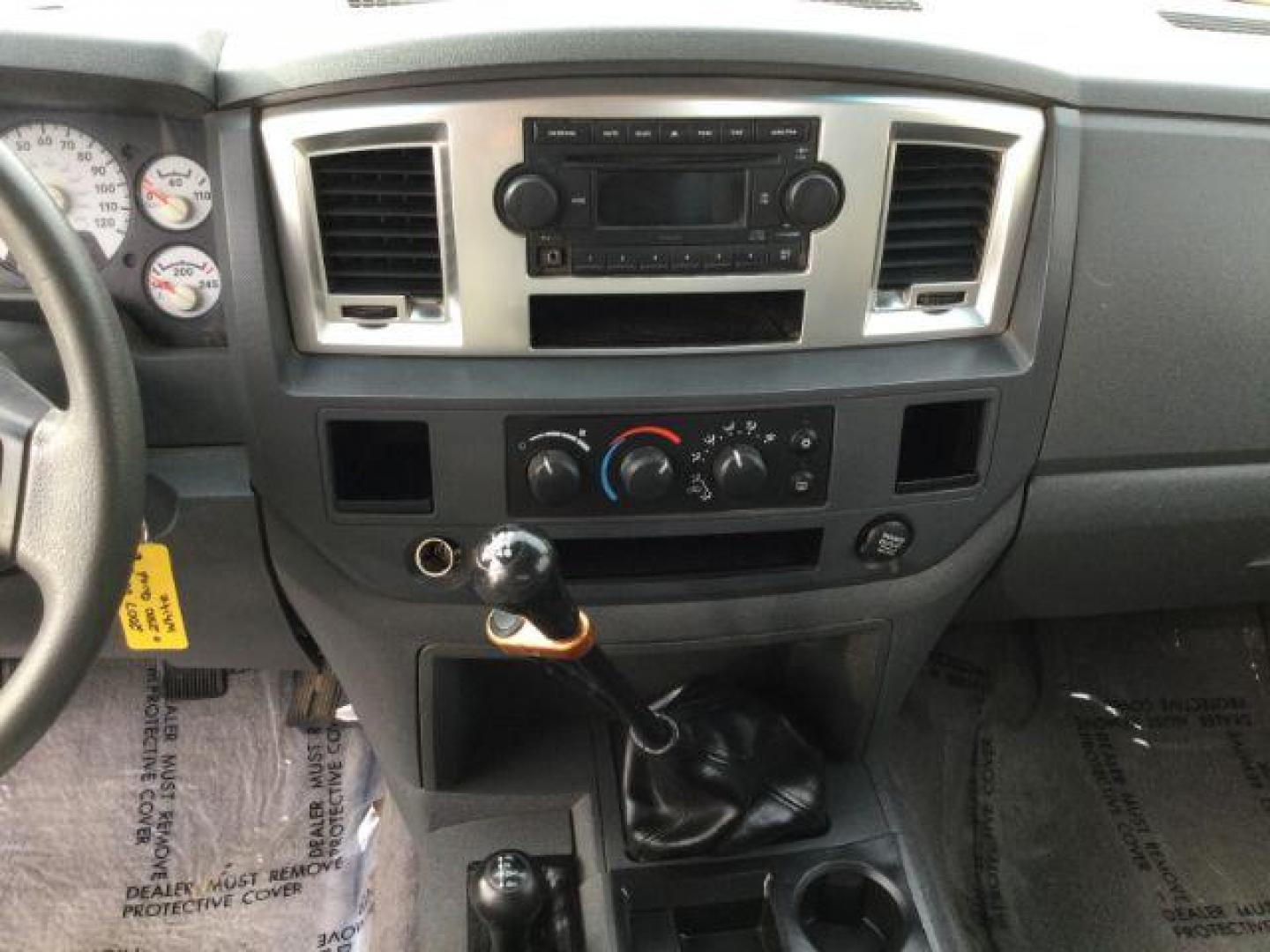 2007 Bright White /Medium Slate Gray Cloth Interior Dodge Ram 2500 SLT Quad Cab LWB 4WD (3D7KS28C37G) with an 5.9L L6 OHV 24V TURBO DIESEL engine, 6-Speed Manual transmission, located at 1801 Main Street, Lewiston, 83501, (208) 743-9371, 46.417065, -117.004799 - Photo#7