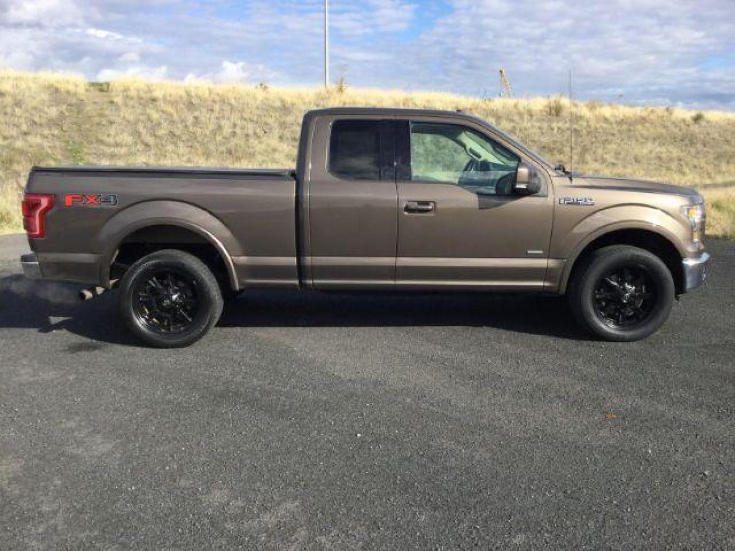 2016 Caribou Metallic /Medium Light Camel, leather Ford F-150 Lariat SuperCab 6.5-ft. 4WD (1FTEX1EP2GF) with an 2.7L V6 DOHC 24V engine, 6-Speed Automatic transmission, located at 1801 Main Street, Lewiston, 83501, (208) 743-9371, 46.417065, -117.004799 - Photo#7