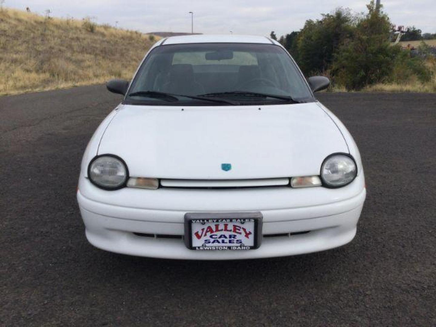 1997 White /Dark Gray Cloth Dodge Neon Sedan (1B3ES27C7VD) with an 2.0L L4 SOHC 16V engine, 3-Speed Automatic transmission, located at 1801 Main Street, Lewiston, 83501, (208) 743-9371, 46.417065, -117.004799 - Photo#10