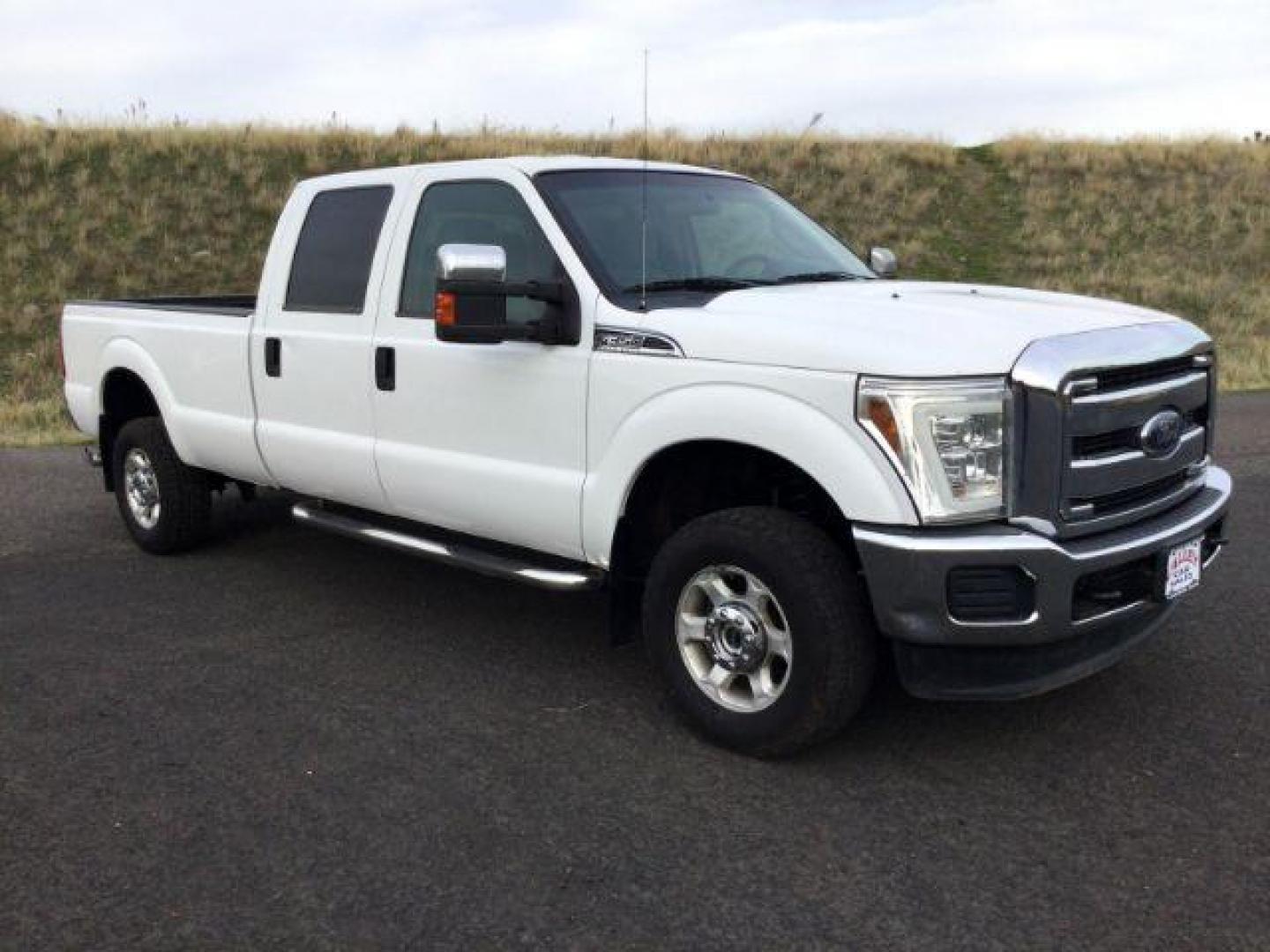 2015 Oxford White /Steel Ford F-350 SD XLT Crew Cab Long Bed 4WD (1FT8W3BT9FE) with an 6.7L V8 OHV 16V DIESEL engine, 6-Speed Automatic transmission, located at 1801 Main Street, Lewiston, 83501, (208) 743-9371, 46.417065, -117.004799 - Photo#14