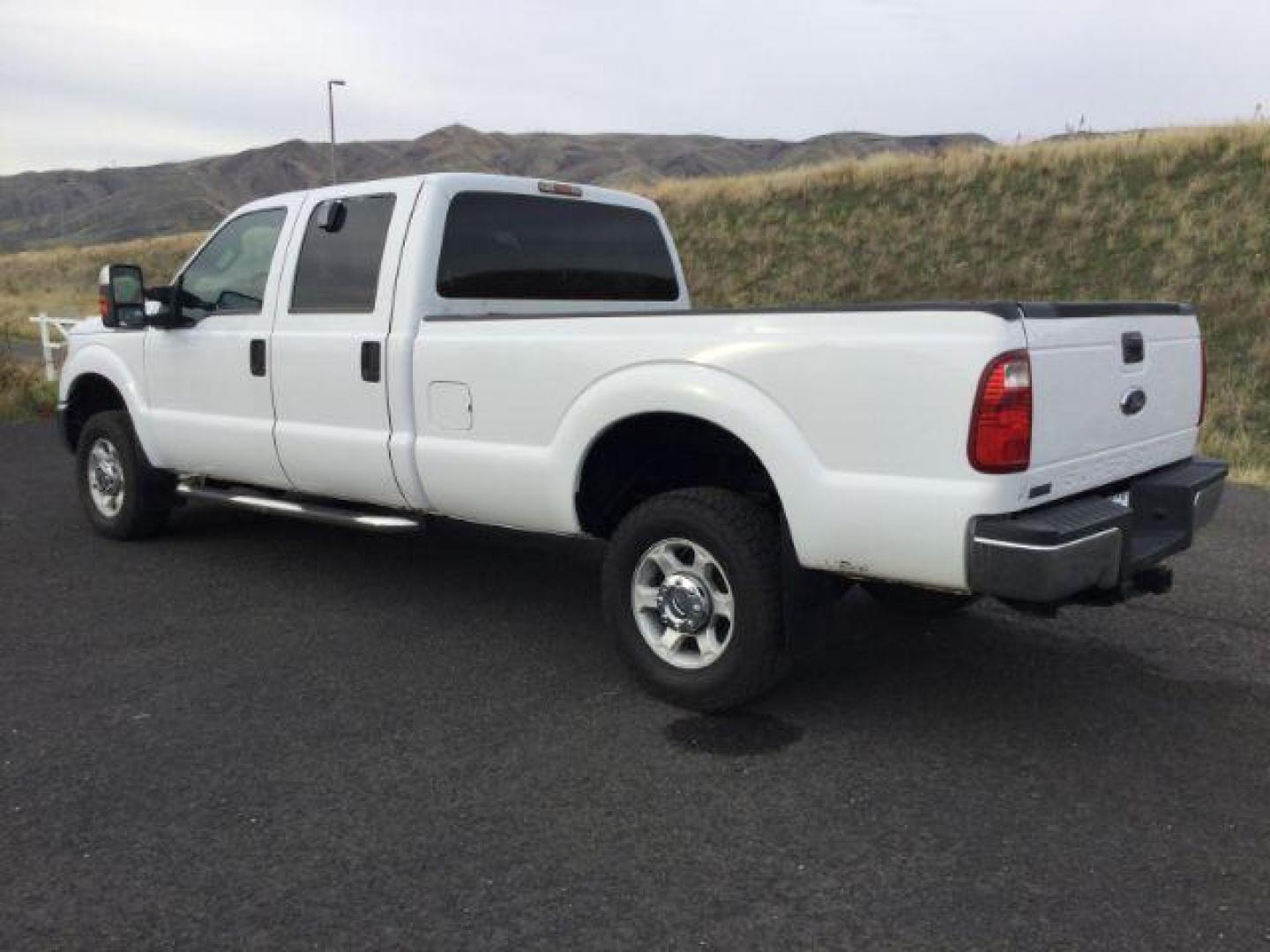 2015 Oxford White /Steel Ford F-350 SD XLT Crew Cab Long Bed 4WD (1FT8W3BT9FE) with an 6.7L V8 OHV 16V DIESEL engine, 6-Speed Automatic transmission, located at 1801 Main Street, Lewiston, 83501, (208) 743-9371, 46.417065, -117.004799 - Photo#2