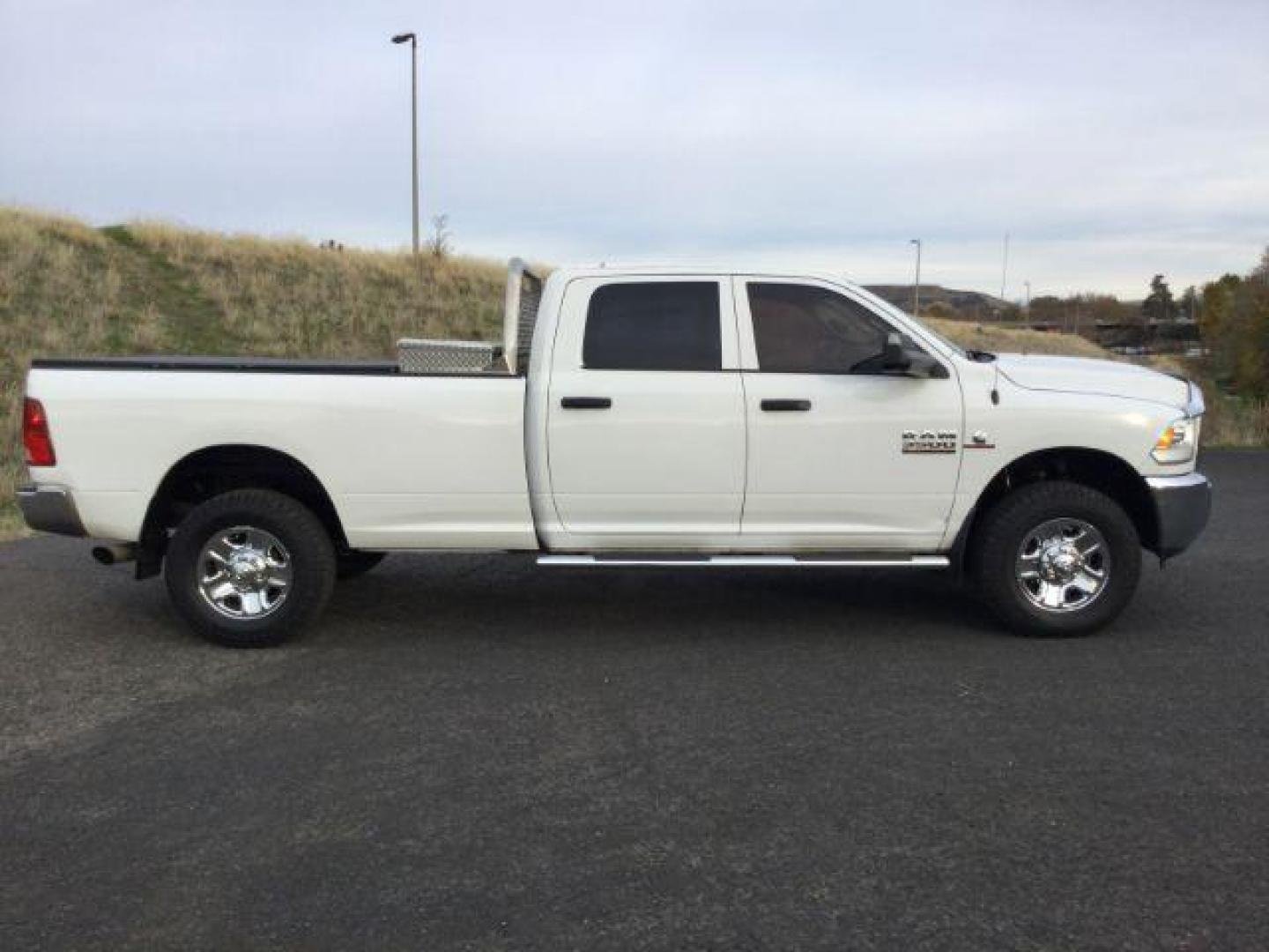 2014 Bright White Clearcoat /Diesel Gray/Black RAM 3500 ST Crew Cab LWB 4WD (3C63R3GL4EG) with an 6.7L L6 OHV 24V TURBO DIESEL engine, 6-Speed Automatic transmission, located at 1801 Main Street, Lewiston, 83501, (208) 743-9371, 46.417065, -117.004799 - Photo#14