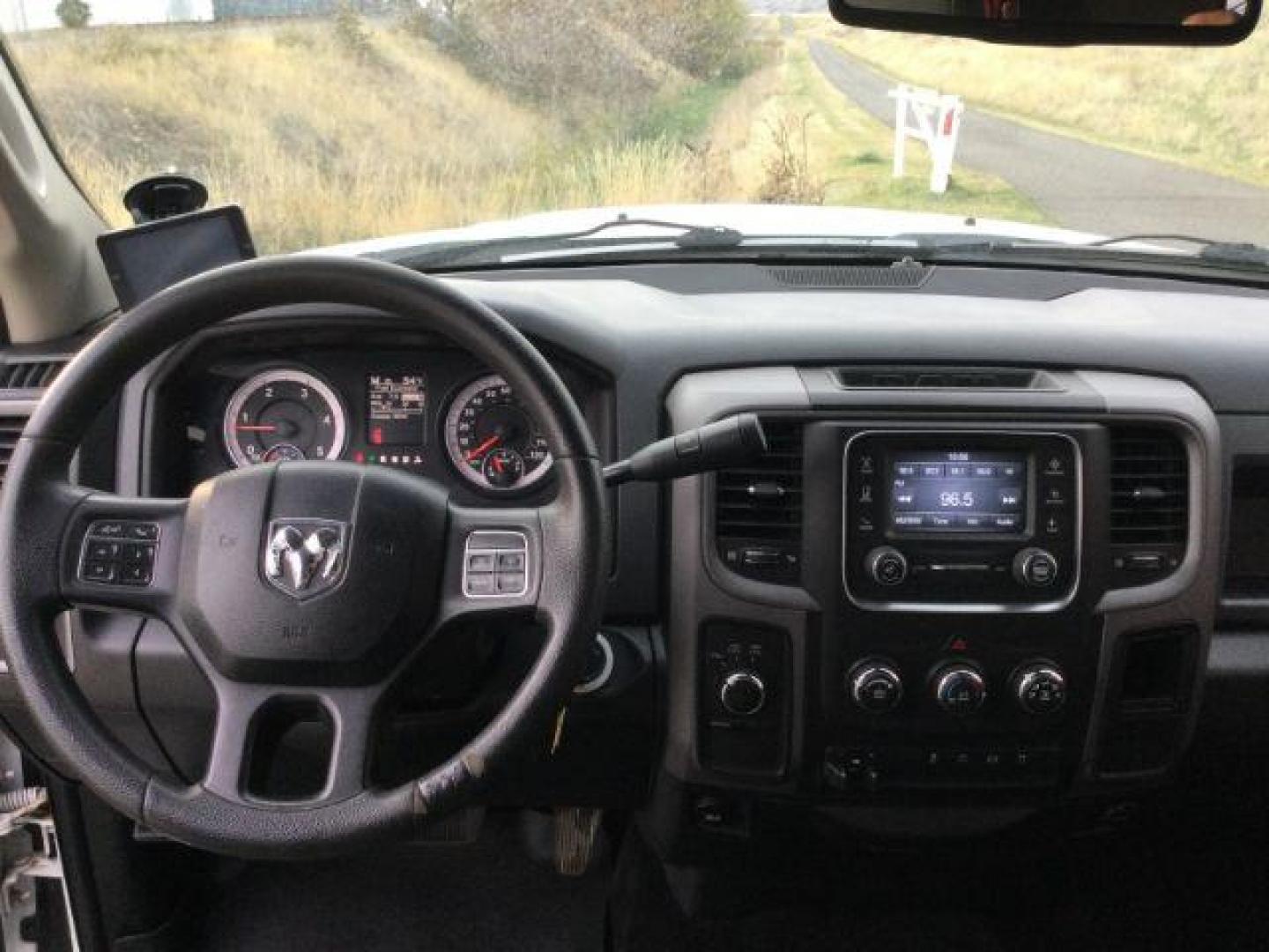 2014 Bright White Clearcoat /Diesel Gray/Black RAM 3500 ST Crew Cab LWB 4WD (3C63R3GL4EG) with an 6.7L L6 OHV 24V TURBO DIESEL engine, 6-Speed Automatic transmission, located at 1801 Main Street, Lewiston, 83501, (208) 743-9371, 46.417065, -117.004799 - Photo#6