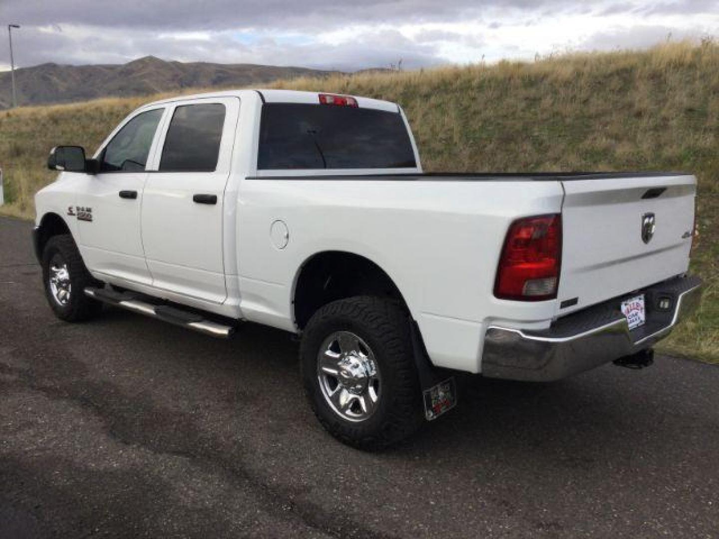 2018 Bright White Clear Coat /Black/Diesel Gray, cloth RAM 2500 Tradesman Crew Cab SWB 4WD (3C6UR5CL4JG) with an 6.7L L6 OHV 24V TURBO DIESEL engine, 6-Speed Automatic transmission, located at 1801 Main Street, Lewiston, 83501, (208) 743-9371, 46.417065, -117.004799 - Photo#2