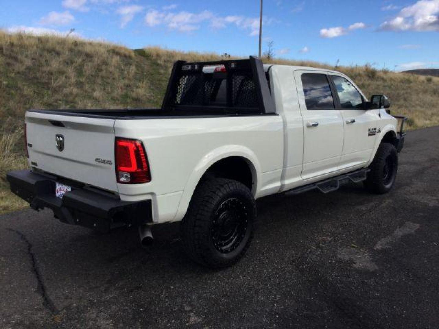 2017 Pearl White /Black, leather RAM 2500 Laramie Mega Cab 4WD (3C6UR5NL5HG) with an 6.7L L6 OHV 24V TURBO DIESEL engine, 6-Speed Automatic transmission, located at 1801 Main Street, Lewiston, 83501, (208) 743-9371, 46.417065, -117.004799 - Photo#22