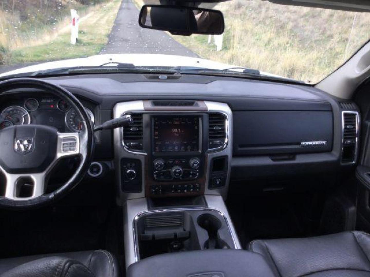 2017 Pearl White /Black, leather RAM 2500 Laramie Mega Cab 4WD (3C6UR5NL5HG) with an 6.7L L6 OHV 24V TURBO DIESEL engine, 6-Speed Automatic transmission, located at 1801 Main Street, Lewiston, 83501, (208) 743-9371, 46.417065, -117.004799 - Photo#5