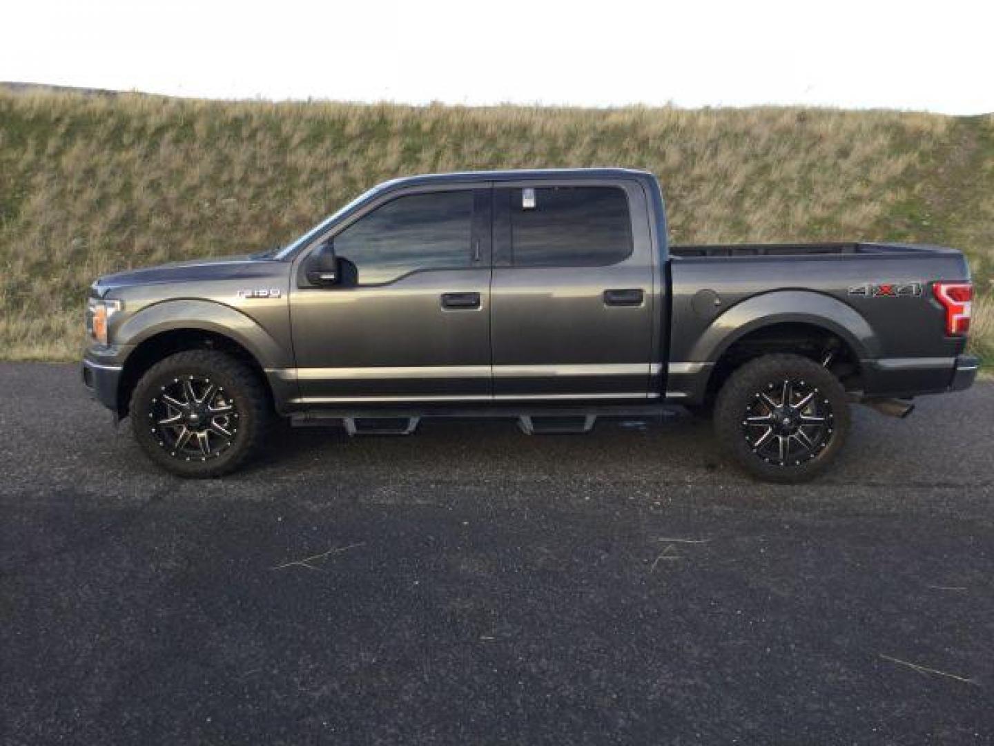 2019 Magnetic Metallic /Medium Earth Gray, cloth Ford F-150 XLT SuperCrew 5.5-ft. Bed 4WD (1FTEW1E53KK) with an 5.0L V8 OHV 32V engine, 10 speed automatic transmission, located at 1801 Main Street, Lewiston, 83501, (208) 743-9371, 46.417065, -117.004799 - Photo#1