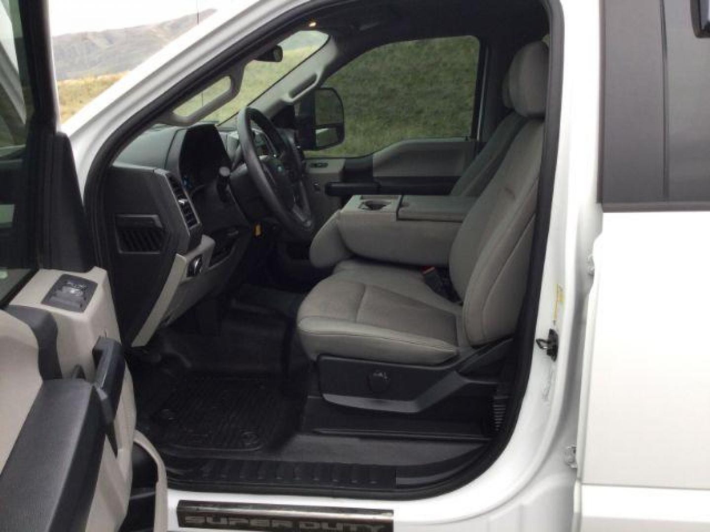 2020 Oxford White /Medium Earth Gray, cloth Ford F-350 SD STX Crew Cab Long Bed 4WD (1FT8W3BT9LE) with an 6.7L V8 OHV 16V DIESEL engine, 10-speed automatic transmission, located at 1801 Main Street, Lewiston, 83501, (208) 743-9371, 46.417065, -117.004799 - Photo#4