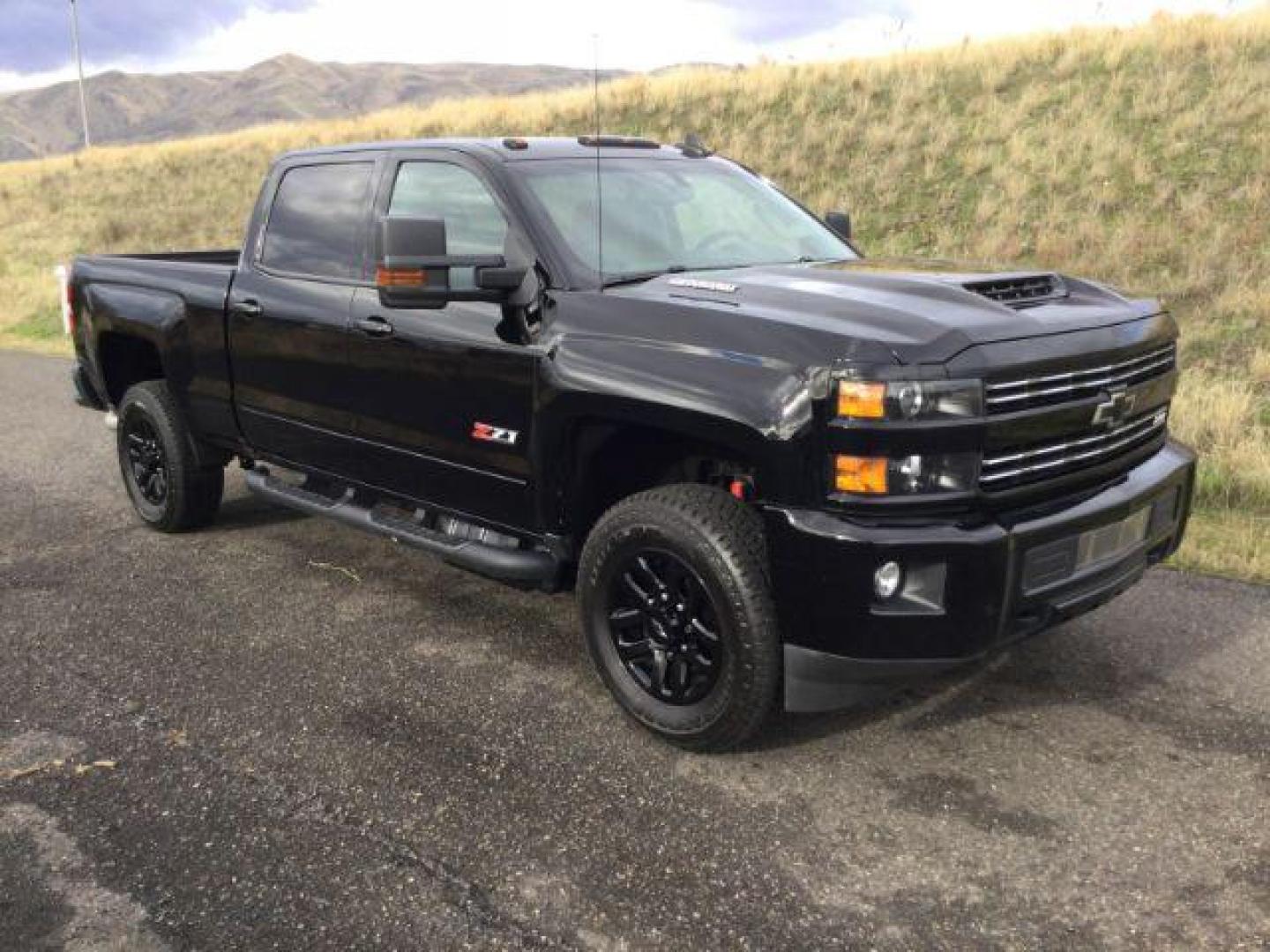 2019 Black /Jet Black, leather Chevrolet Silverado 2500HD LT Crew Cab Short Box 4WD (1GC1KSEY8KF) with an 6.6L V8 OHV 16V DIESEL engine, 6-Speed Automatic transmission, located at 1801 Main Street, Lewiston, 83501, (208) 743-9371, 46.417065, -117.004799 - Photo#12