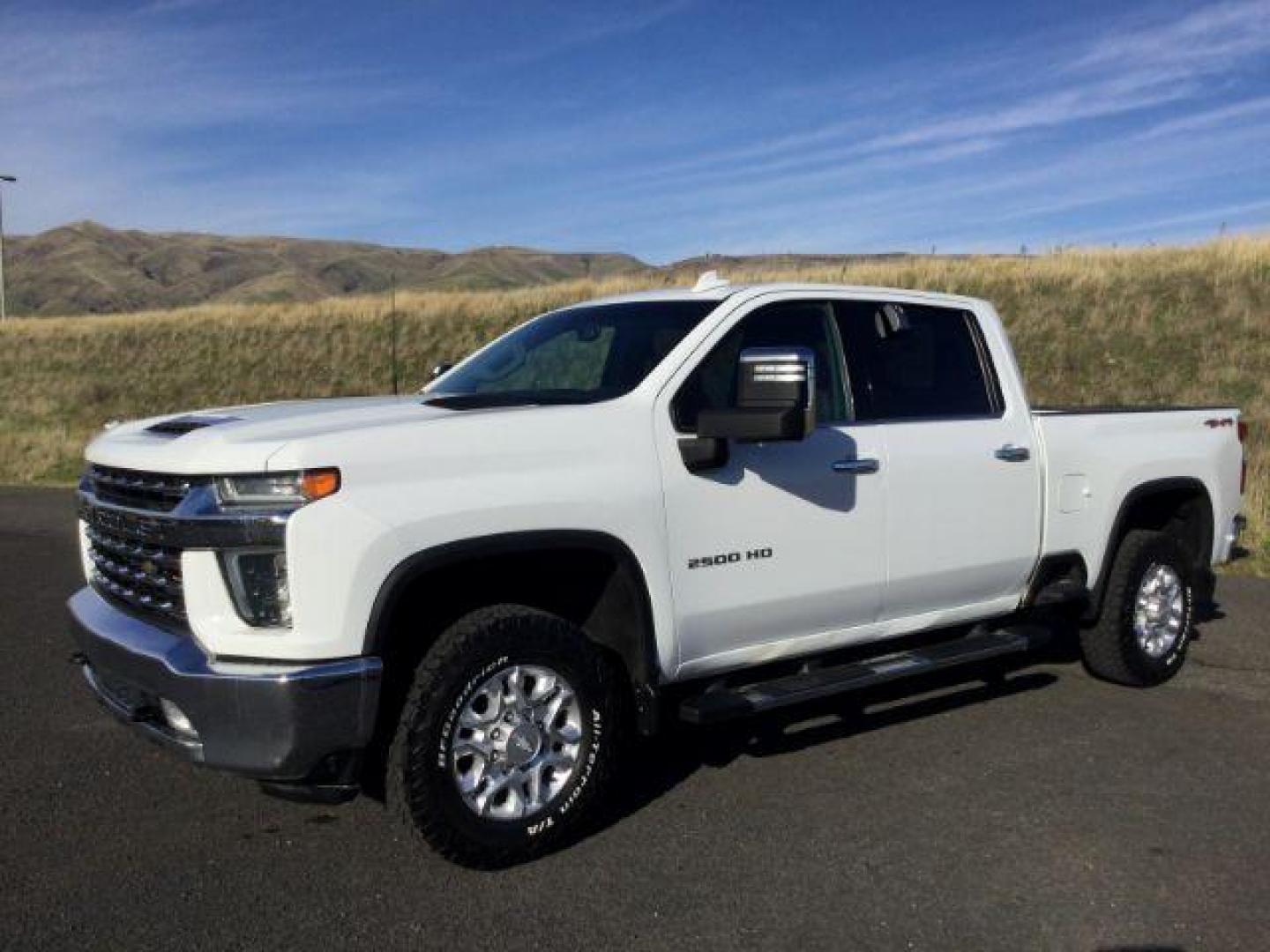 2020 Summit White Chevrolet Silverado 2500HD LTZ Crew Cab Short Box 4WD (1GC4YPE77LF) with an 6.6L V8 OHV 16V engine, 6-Speed Automatic transmission, located at 1801 Main Street, Lewiston, 83501, (208) 743-9371, 46.417065, -117.004799 - Photo#0