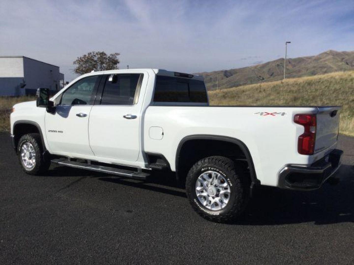 2020 Summit White Chevrolet Silverado 2500HD LTZ Crew Cab Short Box 4WD (1GC4YPE77LF) with an 6.6L V8 OHV 16V engine, 6-Speed Automatic transmission, located at 1801 Main Street, Lewiston, 83501, (208) 743-9371, 46.417065, -117.004799 - Photo#2