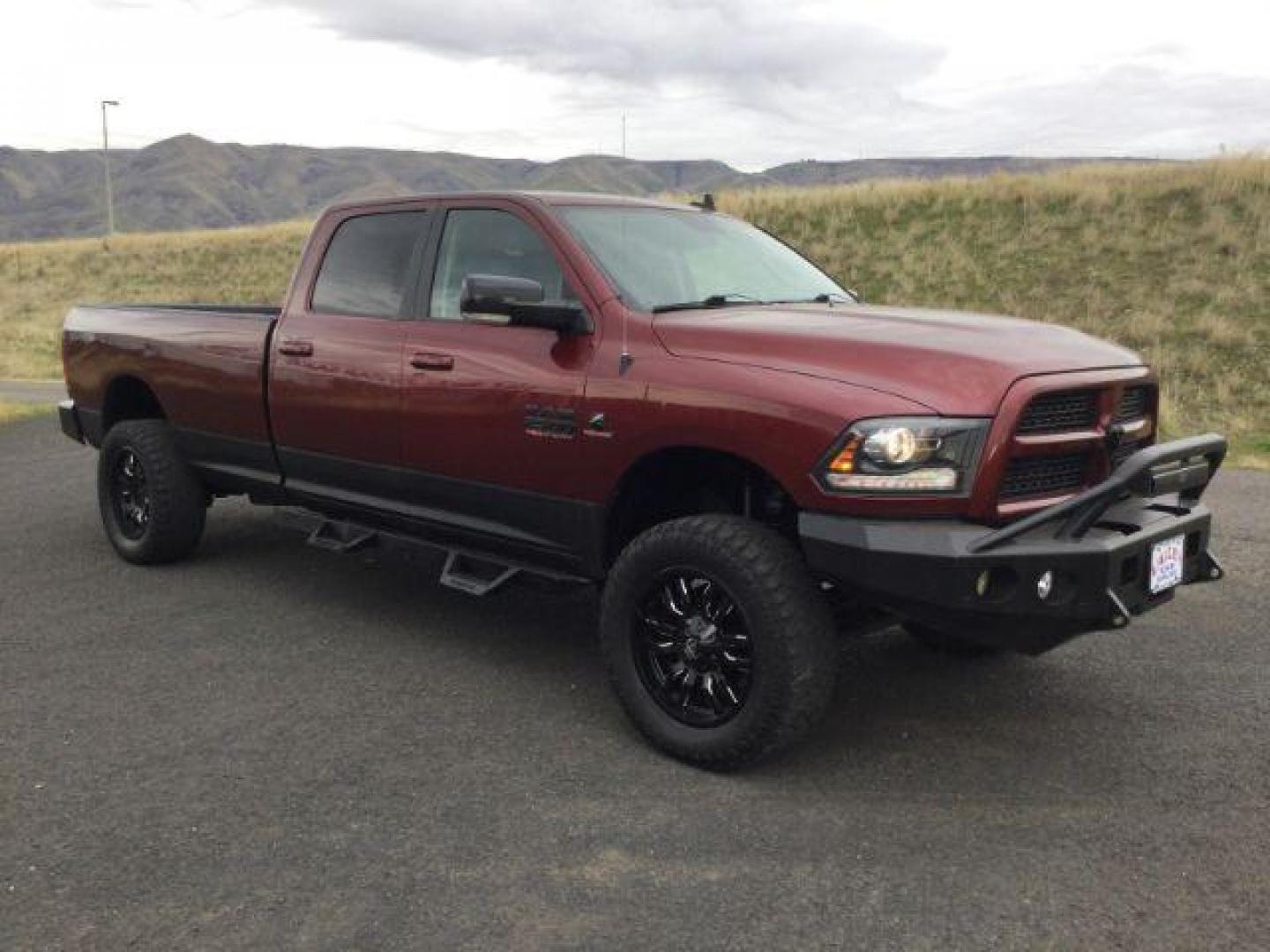 2017 Delmonico Red Pearl Coat /Black, leather RAM 2500 Laramie Crew Cab LWB 4WD (3C6UR5KLXHG) with an 6.7L L6 OHV 24V TURBO DIESEL engine, 6-Speed Automatic transmission, located at 1801 Main Street, Lewiston, 83501, (208) 743-9371, 46.417065, -117.004799 - Photo#10