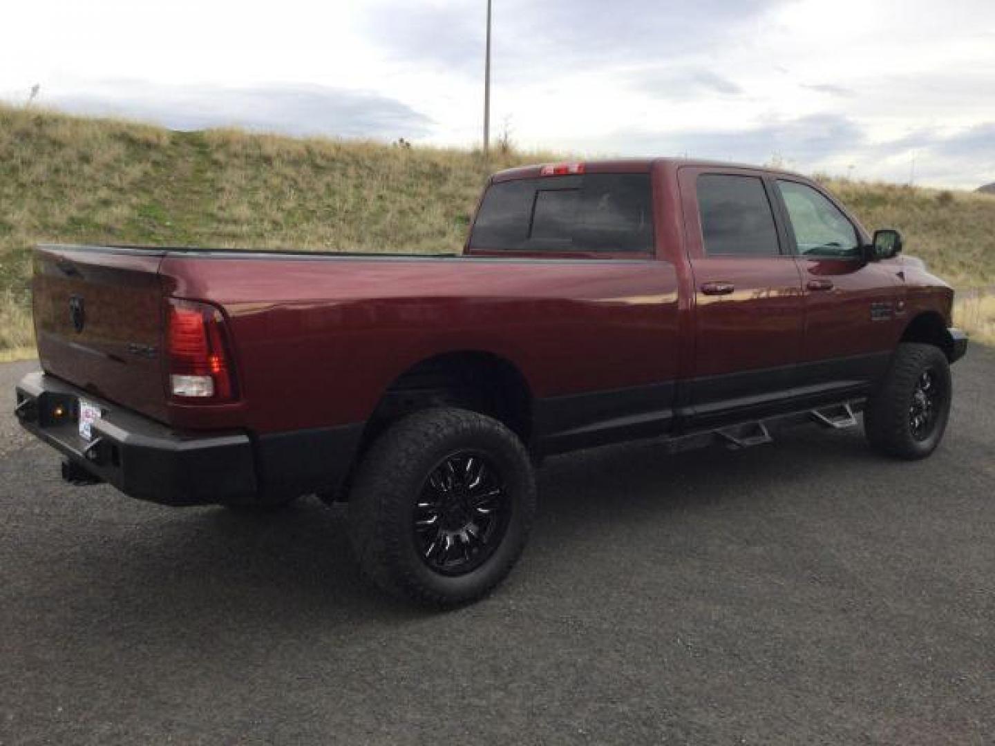 2017 Delmonico Red Pearl Coat /Black, leather RAM 2500 Laramie Crew Cab LWB 4WD (3C6UR5KLXHG) with an 6.7L L6 OHV 24V TURBO DIESEL engine, 6-Speed Automatic transmission, located at 1801 Main Street, Lewiston, 83501, (208) 743-9371, 46.417065, -117.004799 - Photo#12