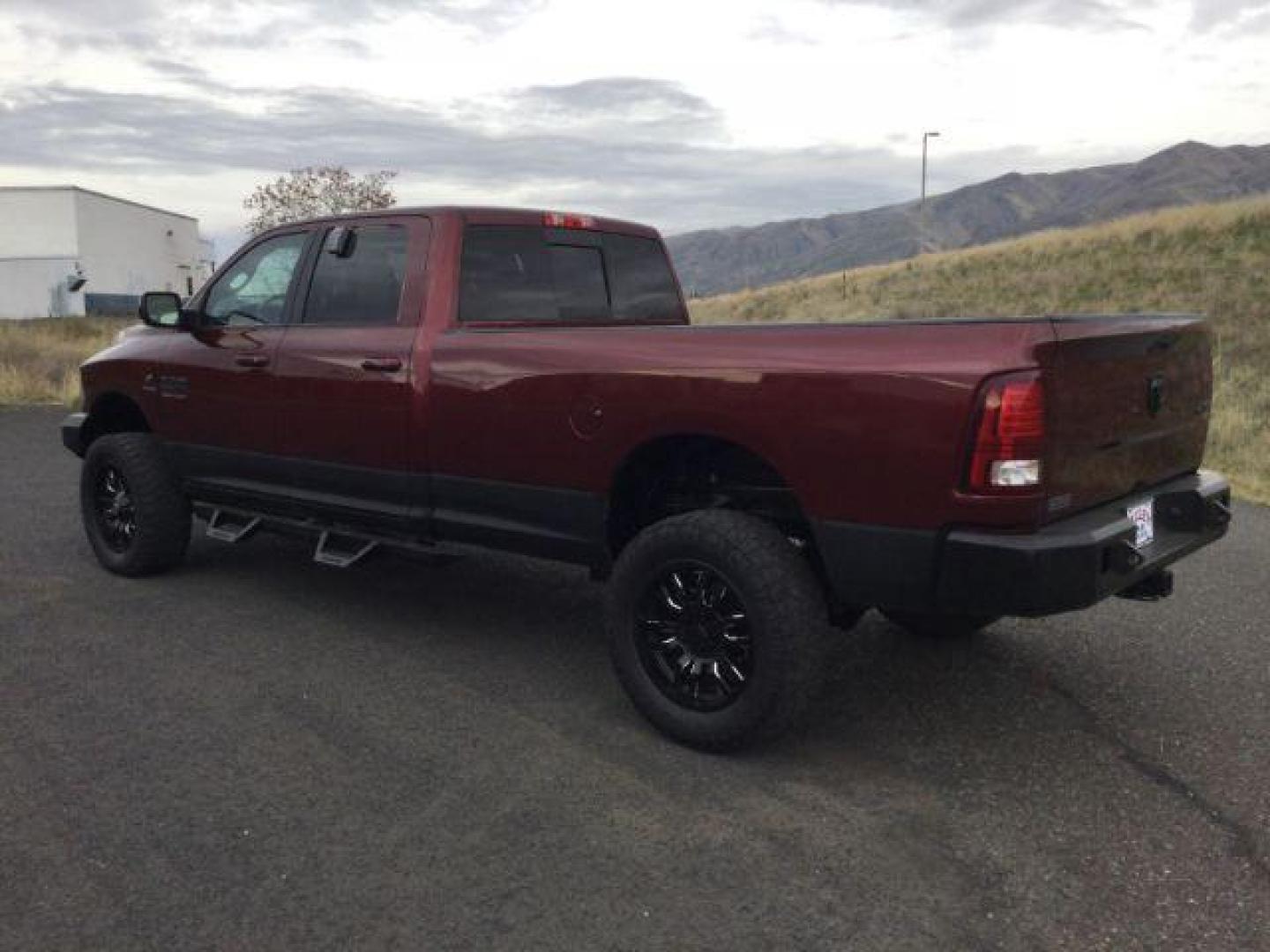 2017 Delmonico Red Pearl Coat /Black, leather RAM 2500 Laramie Crew Cab LWB 4WD (3C6UR5KLXHG) with an 6.7L L6 OHV 24V TURBO DIESEL engine, 6-Speed Automatic transmission, located at 1801 Main Street, Lewiston, 83501, (208) 743-9371, 46.417065, -117.004799 - Photo#2