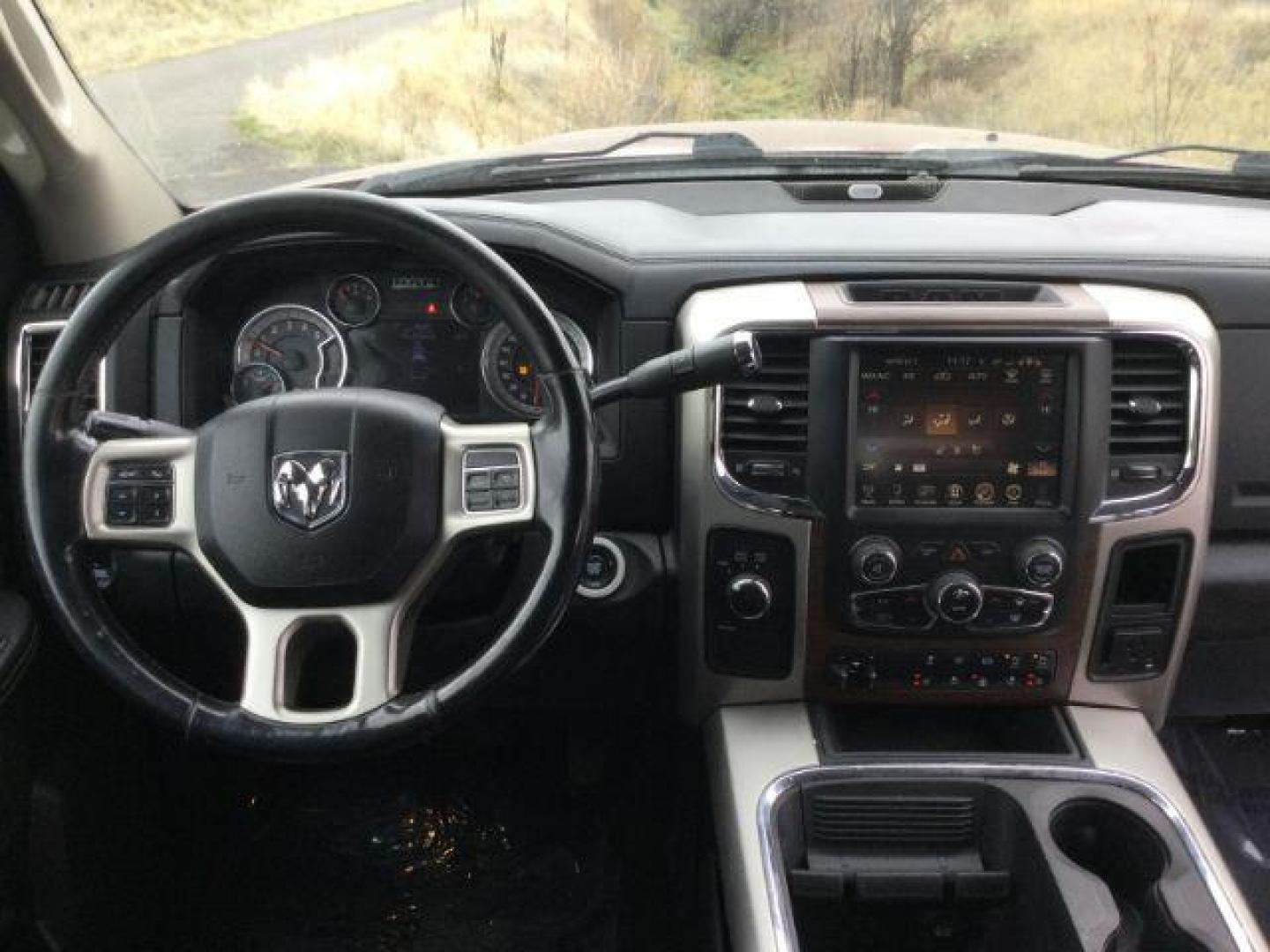 2017 Delmonico Red Pearl Coat /Black, leather RAM 2500 Laramie Crew Cab LWB 4WD (3C6UR5KLXHG) with an 6.7L L6 OHV 24V TURBO DIESEL engine, 6-Speed Automatic transmission, located at 1801 Main Street, Lewiston, 83501, (208) 743-9371, 46.417065, -117.004799 - Photo#6