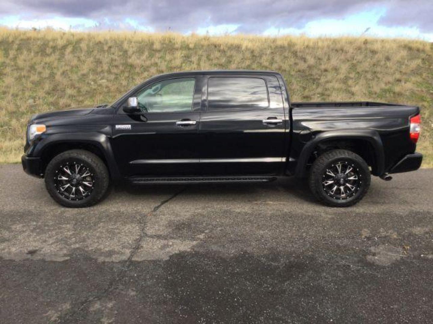 2016 Midnight Black Metallic /Black, premium leather Toyota Tundra Platinum CrewMax 5.7L 4WD (5TFAY5F14GX) with an 5.7L V8 DOHC 32V engine, 6-Speed Automatic transmission, located at 1801 Main Street, Lewiston, 83501, (208) 743-9371, 46.417065, -117.004799 - Photo#1