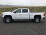 2018 Summit White /Jet Black, leather GMC Sierra 3500HD SLT Crew Cab 4WD (1GT42XCG2JF) with an 6.0L V8 OHV 16V FFV engine, 6-Speed Automatic transmission, located at 1801 Main Street, Lewiston, 83501, (208) 743-9371, 46.417065, -117.004799 - Photo#1