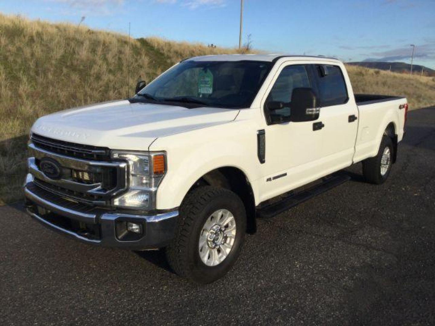 2021 Oxford White /Medium Earth Gray Ford F-350 SD XLT Crew Cab Long Bed 4WD (1FT8W3BT0ME) with an 6.7L V8 OHV 16V DIESEL engine, 10-speed automatic transmission, located at 1801 Main Street, Lewiston, 83501, (208) 743-9371, 46.417065, -117.004799 - Photo#0