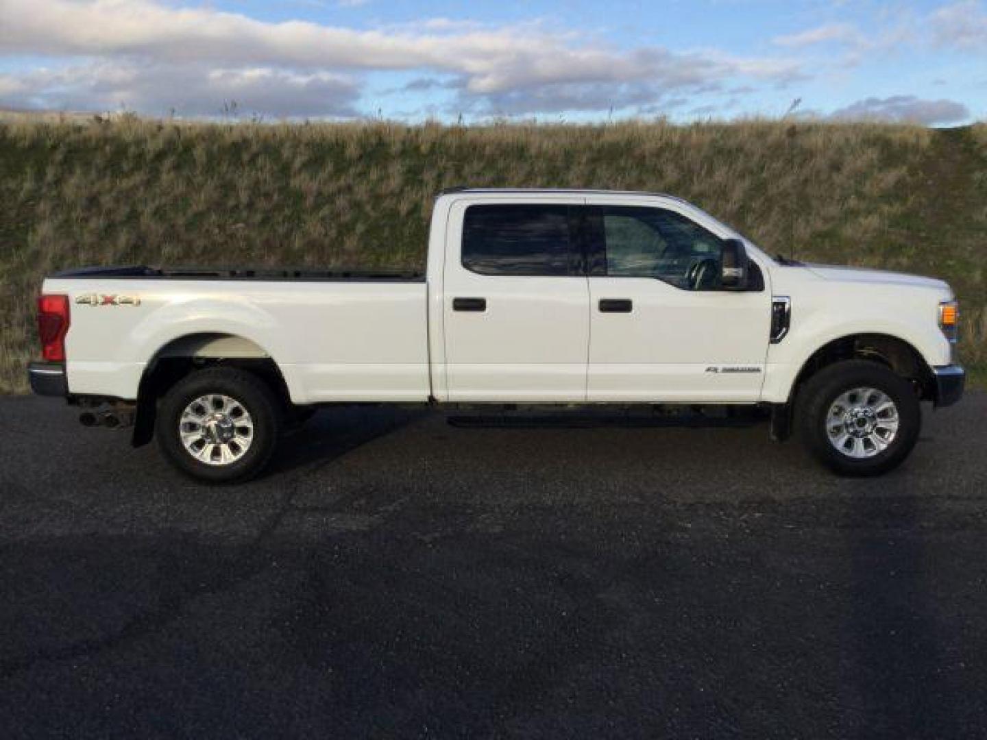 2021 Oxford White /Medium Earth Gray Ford F-350 SD XLT Crew Cab Long Bed 4WD (1FT8W3BT0ME) with an 6.7L V8 OHV 16V DIESEL engine, 10-speed automatic transmission, located at 1801 Main Street, Lewiston, 83501, (208) 743-9371, 46.417065, -117.004799 - Photo#13