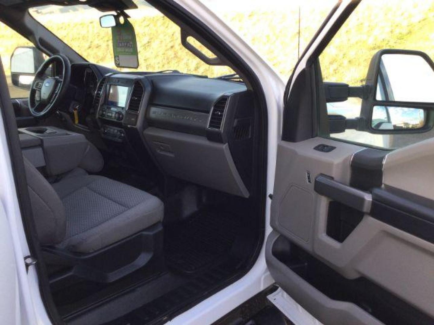 2021 Oxford White /Medium Earth Gray Ford F-350 SD XLT Crew Cab Long Bed 4WD (1FT8W3BT0ME) with an 6.7L V8 OHV 16V DIESEL engine, 10-speed automatic transmission, located at 1801 Main Street, Lewiston, 83501, (208) 743-9371, 46.417065, -117.004799 - Photo#18