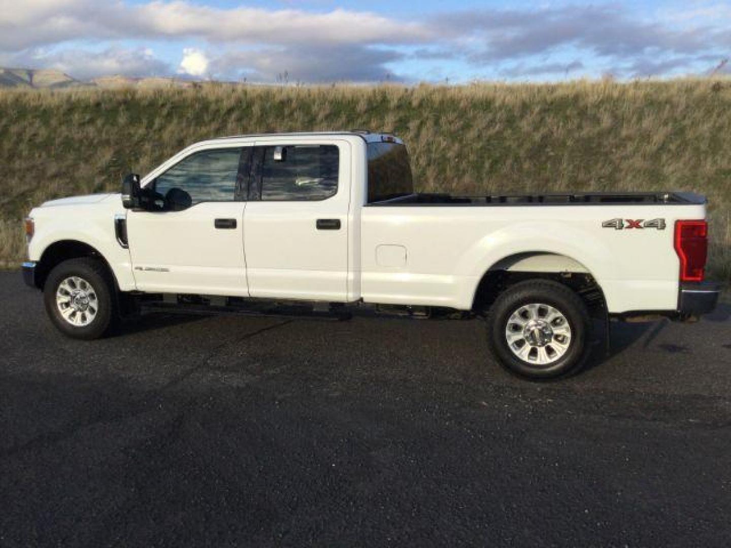 2021 Oxford White /Medium Earth Gray Ford F-350 SD XLT Crew Cab Long Bed 4WD (1FT8W3BT0ME) with an 6.7L V8 OHV 16V DIESEL engine, 10-speed automatic transmission, located at 1801 Main Street, Lewiston, 83501, (208) 743-9371, 46.417065, -117.004799 - Photo#1