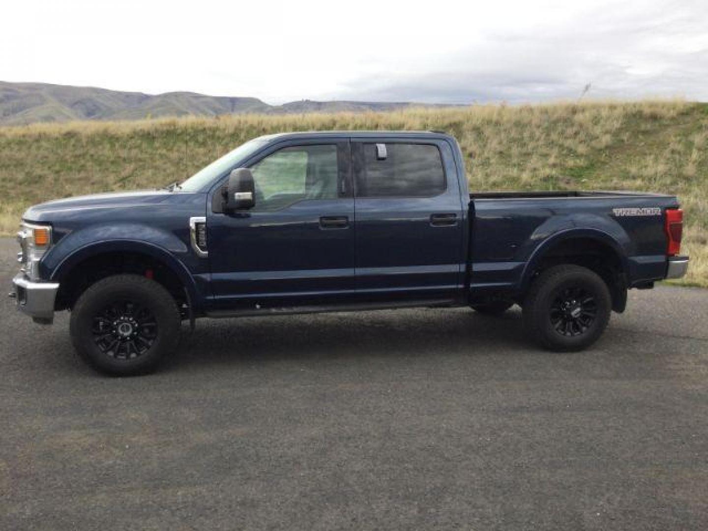 2020 Blue Jeans Metallic /GRAY CLOTH Ford F-350 SD XLT CREW CAB 4WD (1FT8W3BN7LE) with an 7.3L V8 OHV 16V engine, 10-speed automatic transmission, located at 1801 Main Street, Lewiston, 83501, (208) 743-9371, 46.417065, -117.004799 - Photo#1