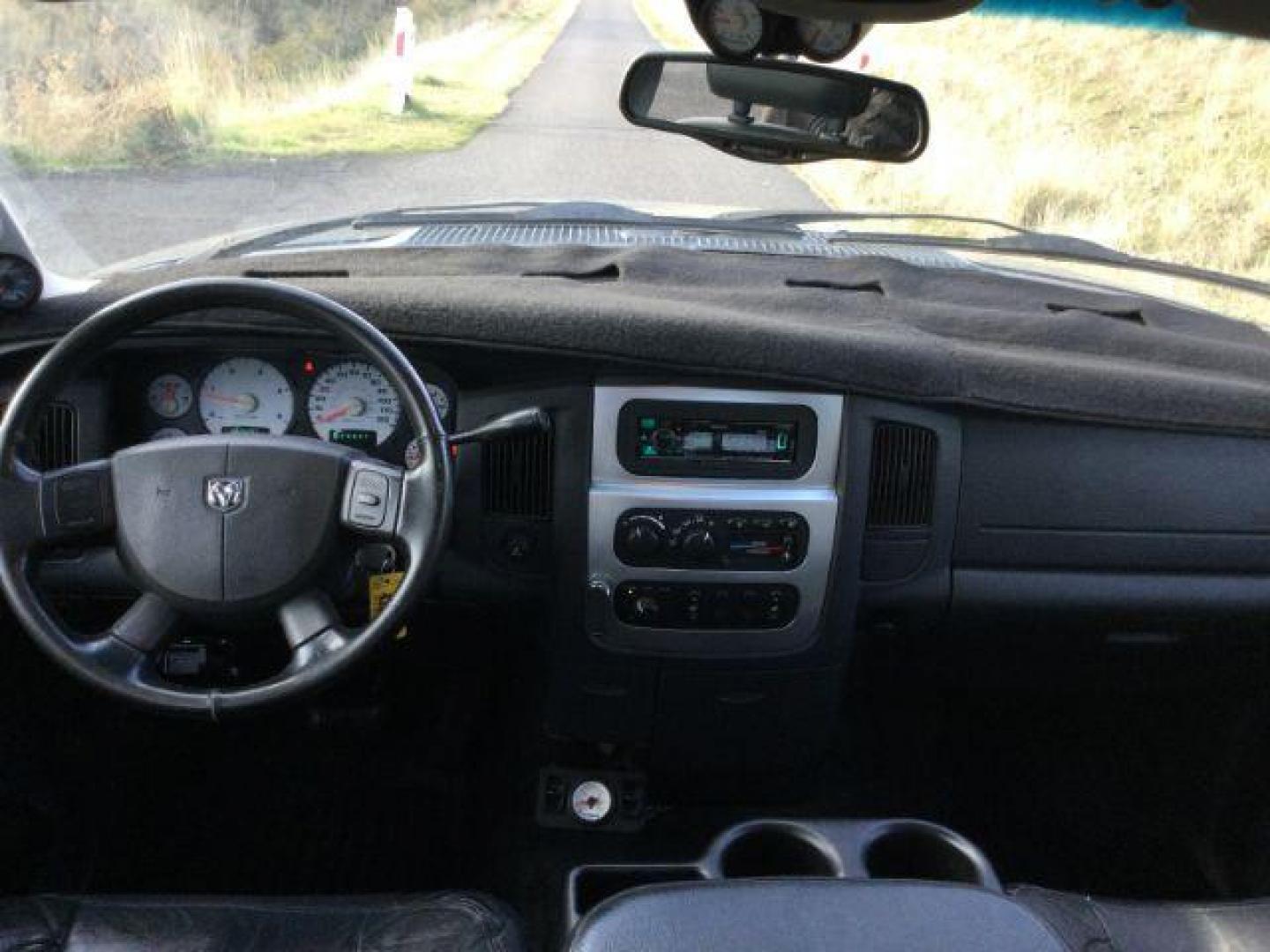 2004 Graphite Metallic/Bright Silver Metallic /Dark Slate Gray Leather Interior Dodge Ram 2500 Laramie Quad Cab Long Bed 4WD (3D7KU28C24G) with an 5.9L L6 OHV 24V TURBO DIESEL engine, 4-Speed Automatic transmission, located at 1801 Main Street, Lewiston, 83501, (208) 743-9371, 46.417065, -117.004799 - Photo#22