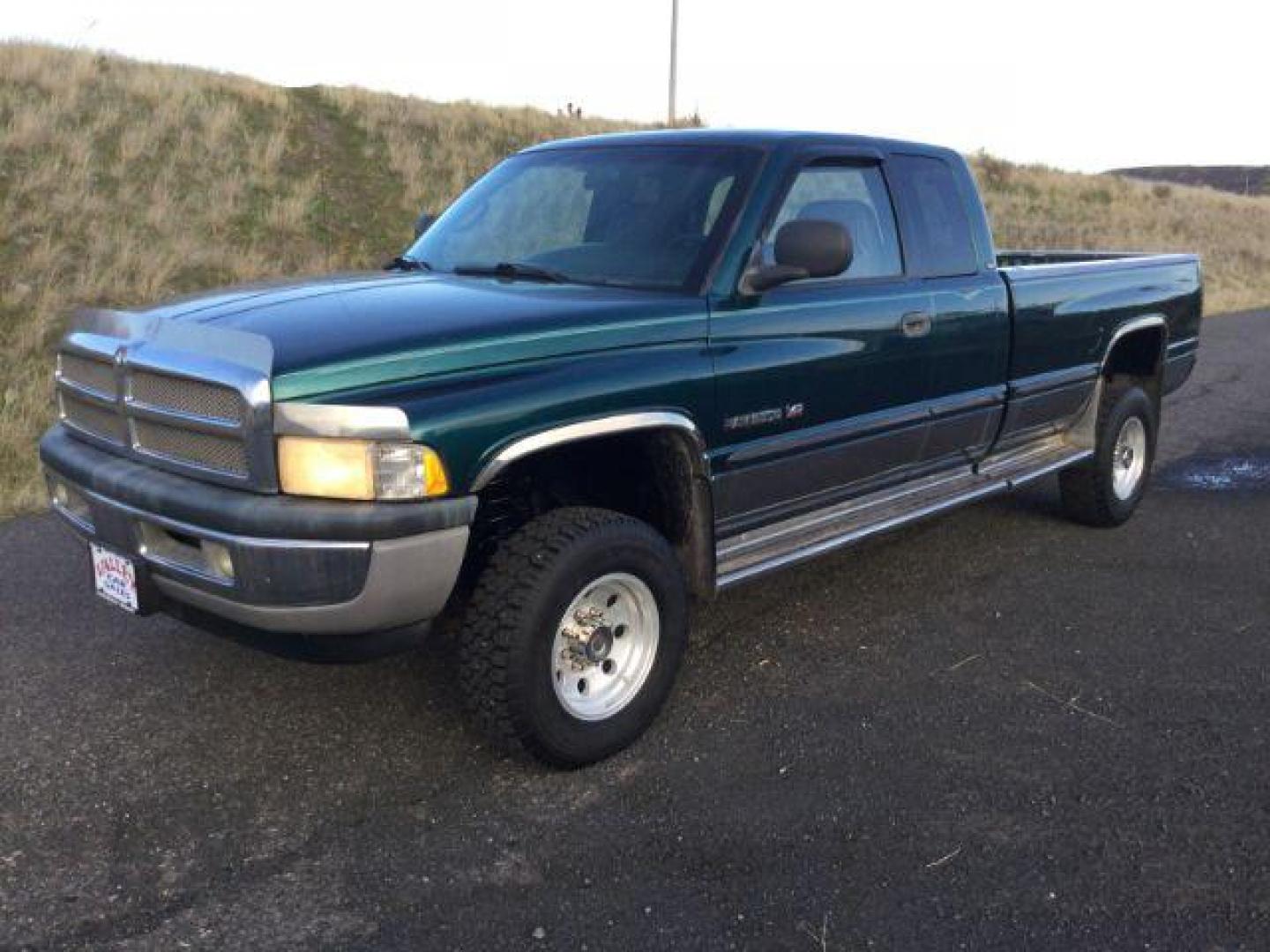 1999 Dodge Ram 2500 Quad Cab Long Bed 4WD (3B7KF23W2XG) with an 8.0L V10 OHV 20V engine, located at 1801 Main Street, Lewiston, 83501, (208) 743-9371, 46.417065, -117.004799 - Photo#0