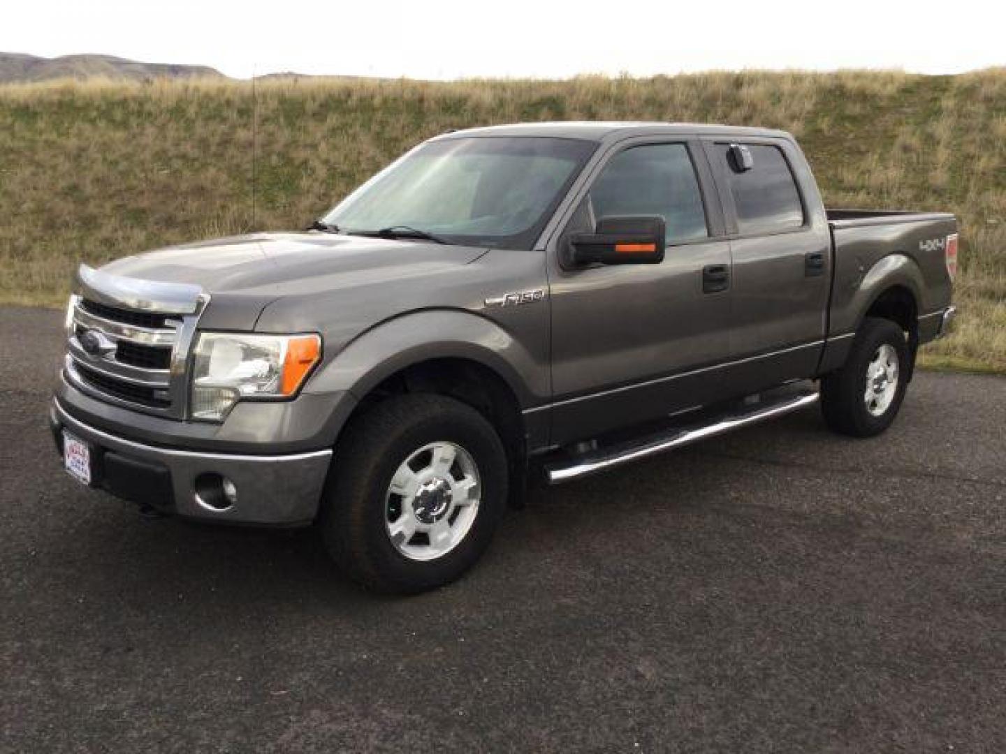 2014 Sterling Gray Metallic /Steel Gray Ford F-150 XLT SuperCrew 5.5-ft. Bed 4WD (1FTFW1EF7EF) with an 5.0L V8 engine, 6-Speed Automatic transmission, located at 1801 Main Street, Lewiston, 83501, (208) 743-9371, 46.417065, -117.004799 - Photo#0