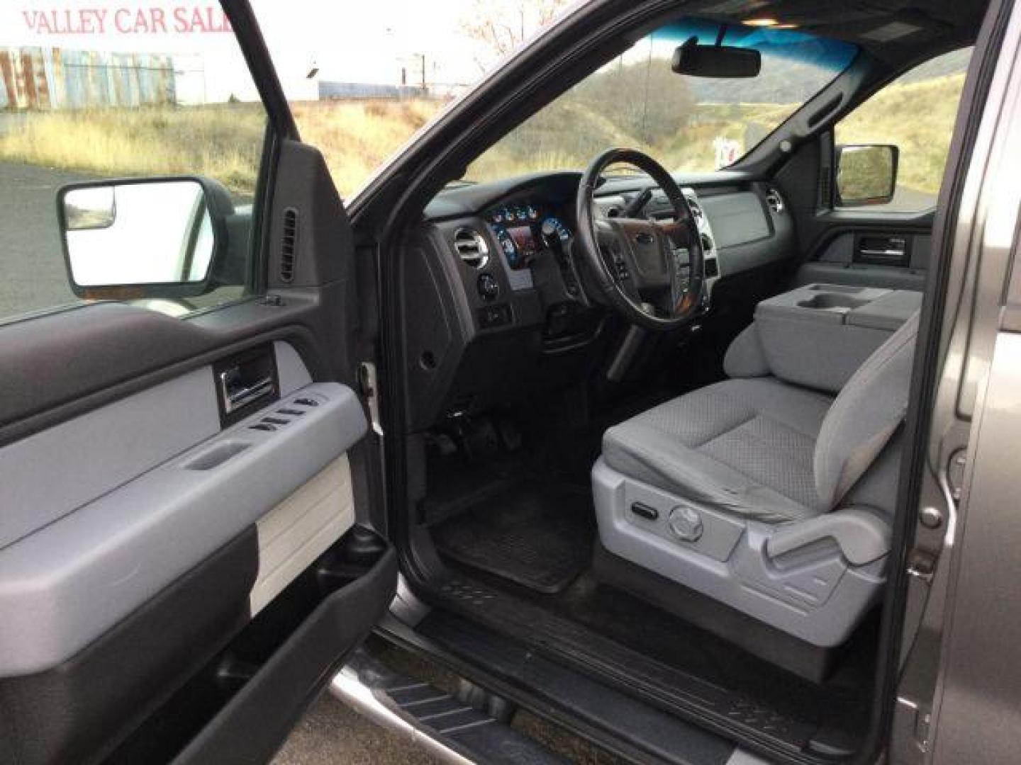 2014 Sterling Gray Metallic /Steel Gray Ford F-150 XLT SuperCrew 5.5-ft. Bed 4WD (1FTFW1EF7EF) with an 5.0L V8 engine, 6-Speed Automatic transmission, located at 1801 Main Street, Lewiston, 83501, (208) 743-9371, 46.417065, -117.004799 - Photo#3