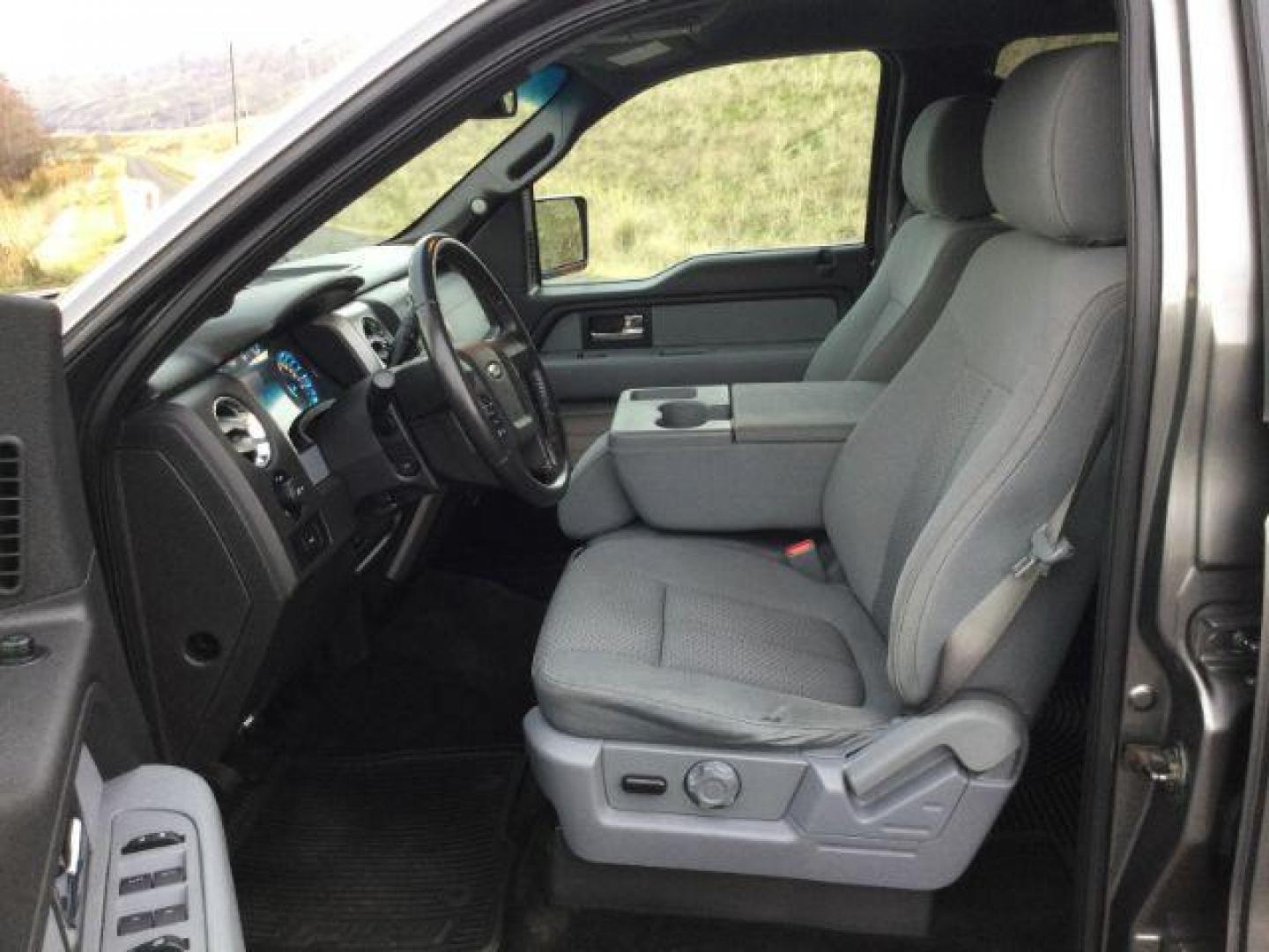 2014 Sterling Gray Metallic /Steel Gray Ford F-150 XLT SuperCrew 5.5-ft. Bed 4WD (1FTFW1EF7EF) with an 5.0L V8 engine, 6-Speed Automatic transmission, located at 1801 Main Street, Lewiston, 83501, (208) 743-9371, 46.417065, -117.004799 - Photo#4