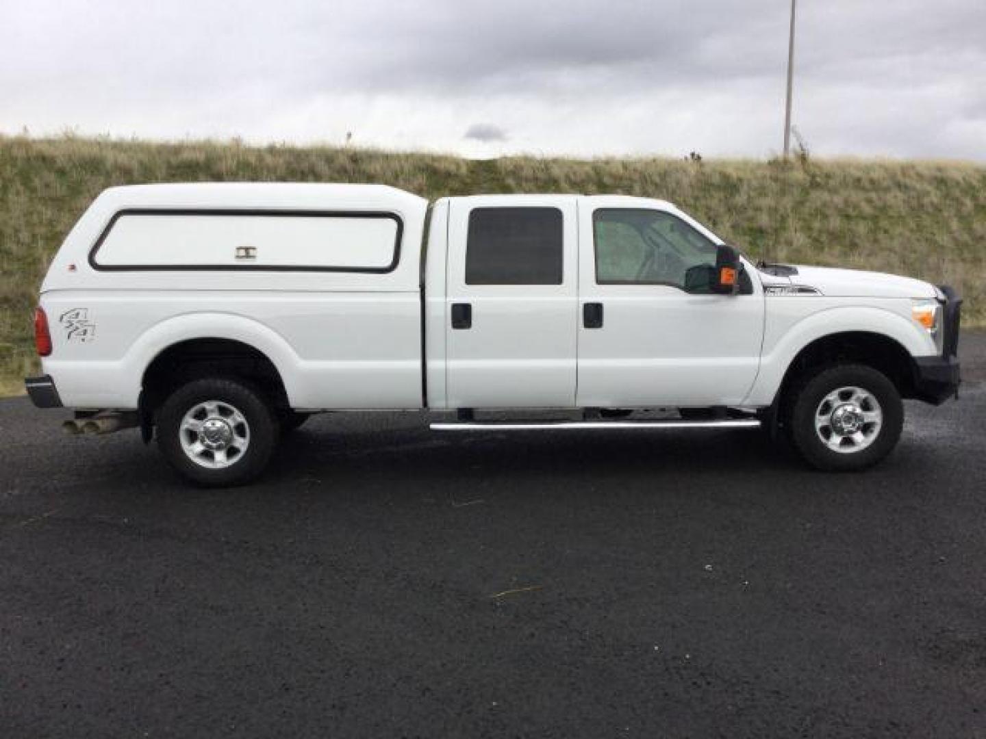 2015 Oxford White /Steel Ford F-350 SD XLT Crew Cab Long Bed 4WD (1FT7W3BTXFE) with an 6.7L V8 OHV 16V DIESEL engine, 6-Speed Automatic transmission, located at 1801 Main Street, Lewiston, 83501, (208) 743-9371, 46.417065, -117.004799 - Photo#11