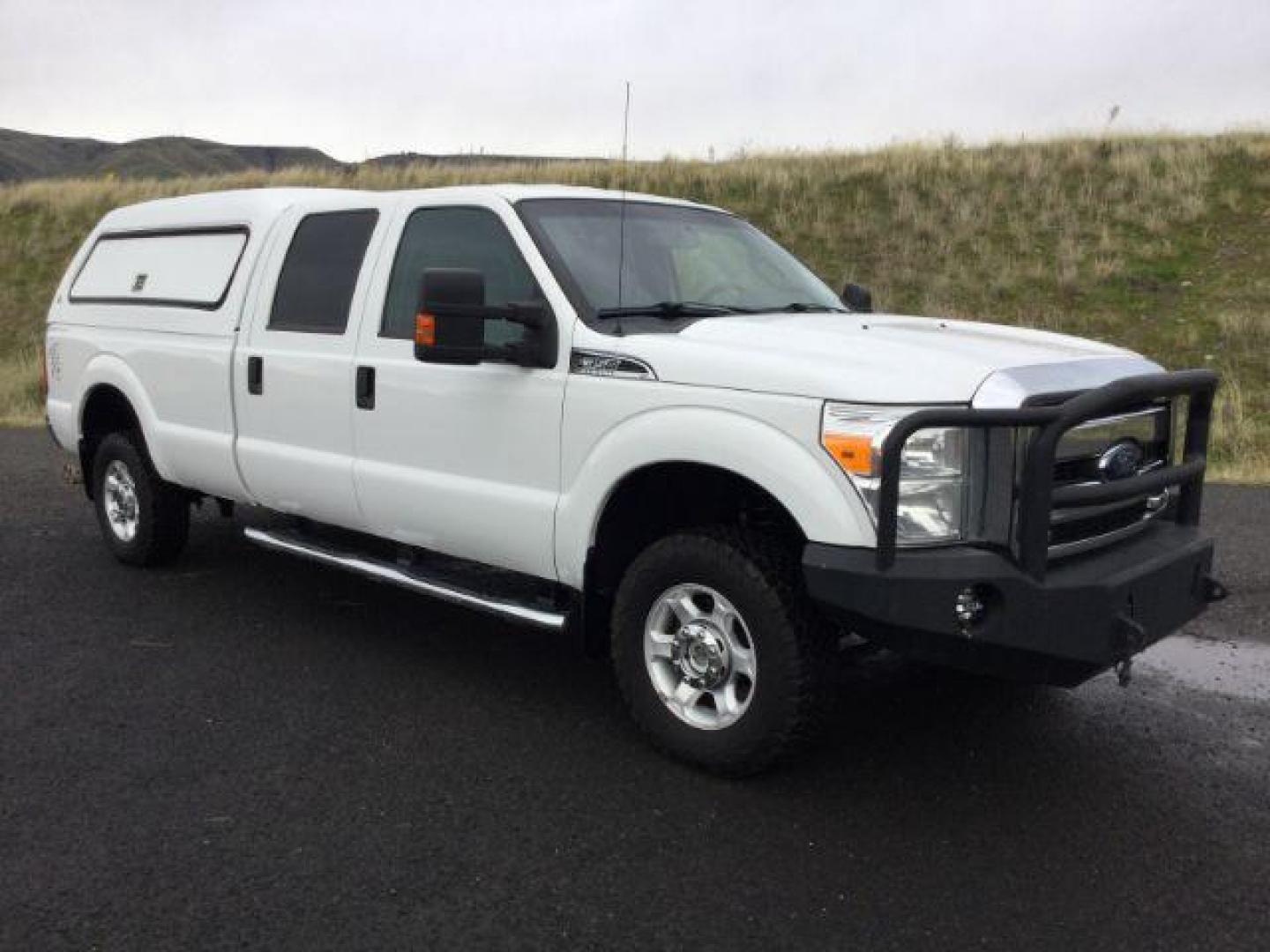 2015 Oxford White /Steel Ford F-350 SD XLT Crew Cab Long Bed 4WD (1FT7W3BTXFE) with an 6.7L V8 OHV 16V DIESEL engine, 6-Speed Automatic transmission, located at 1801 Main Street, Lewiston, 83501, (208) 743-9371, 46.417065, -117.004799 - Photo#12