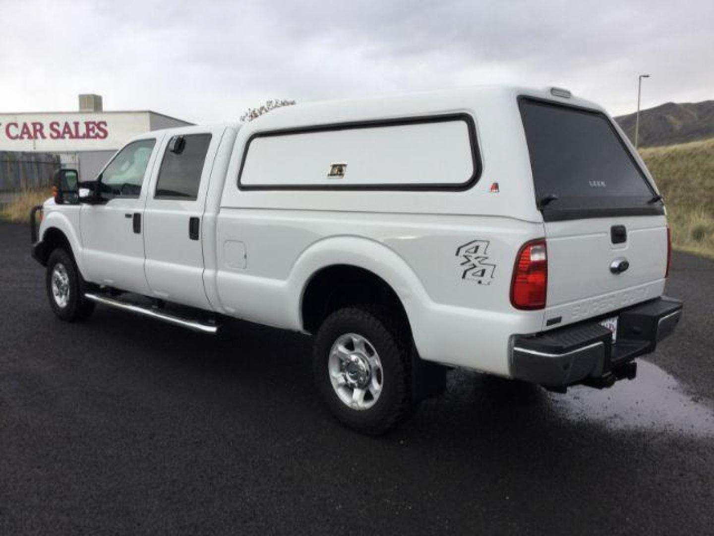 2015 Oxford White /Steel Ford F-350 SD XLT Crew Cab Long Bed 4WD (1FT7W3BTXFE) with an 6.7L V8 OHV 16V DIESEL engine, 6-Speed Automatic transmission, located at 1801 Main Street, Lewiston, 83501, (208) 743-9371, 46.417065, -117.004799 - Photo#2