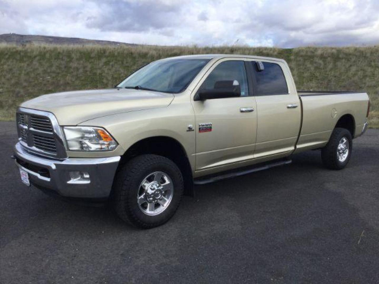 2011 WHITE GOLD /Light Pebble Beige/Bark Brown Cloth Interior RAM 2500 SLT Crew Cab LWB 4WD (3D7UT2CL4BG) with an 6.7L L6 OHV 24V TURBO DIESEL engine, 6-Speed Automatic transmission, located at 1801 Main Street, Lewiston, 83501, (208) 743-9371, 46.417065, -117.004799 - Photo#0