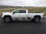 2021 Quicksilver Metallic /Jet Black GMC Sierra 2500HD SLE Crew Cab Long Box 4WD (1GT49MEY5MF) with an 6.6L V8 OHV 16 DIESEL engine, 10-speed automatic transmission, located at 1801 Main Street, Lewiston, 83501, (208) 743-9371, 46.417065, -117.004799 - Photo#1