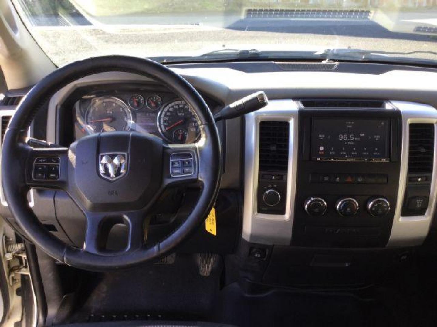 2012 Bright White/Mineral Gray Metallic /Dark Slate/Medium Graystone Cloth Interior RAM 1500 SLT Quad Cab 4WD (1C6RD7GT0CS) with an 5.7L V8 OHV 16V engine, 5-Speed Automatic transmission, located at 1801 Main Street, Lewiston, 83501, (208) 743-9371, 46.417065, -117.004799 - Photo#3