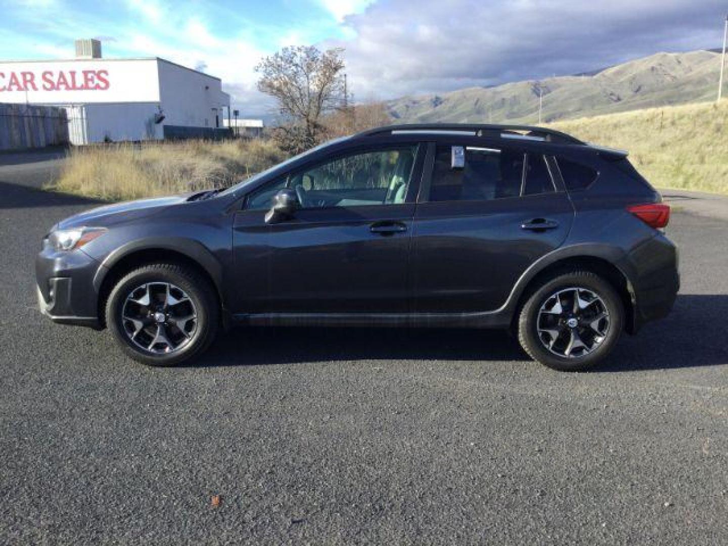 2018 Dark Gray Metallic /Gray Cloth with Orange Stitching, cloth Subaru Crosstrek 2.0i Premium CVT (JF2GTACC5JH) with an 2.0L L4 DOHC 16V engine, Continuously Variable Transmission transmission, located at 1801 Main Street, Lewiston, 83501, (208) 743-9371, 46.417065, -117.004799 - Photo#1