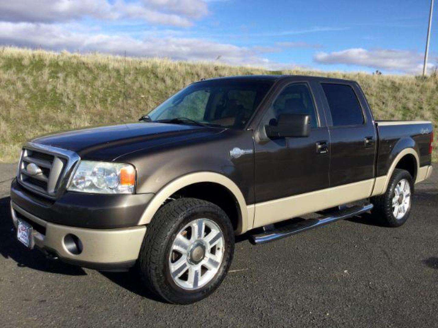 2007 Dark Stone Metallic/Pueblo Gold Metallic /Tan/Castano Brown Leather Interior Ford F-150 Lariat SuperCrew 4WD (1FTPW14V57K) with an 5.4L V8 SOHC 24V FFV engine, 4-Speed Automatic transmission, located at 1801 Main Street, Lewiston, 83501, (208) 743-9371, 46.417065, -117.004799 - Photo#0