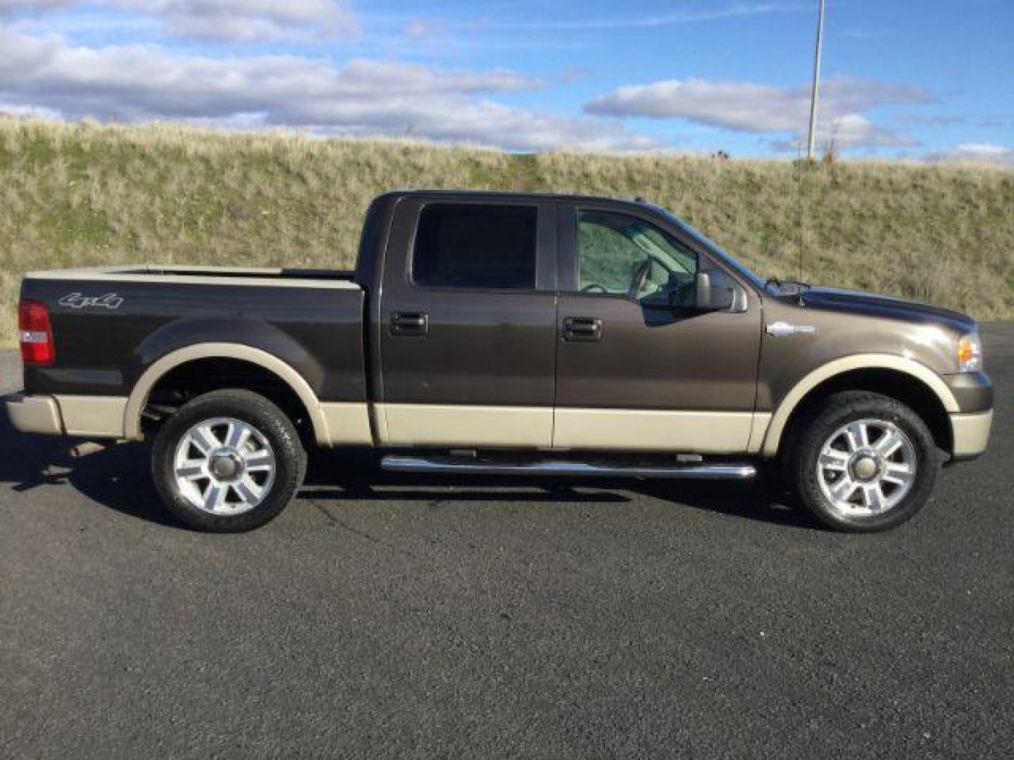 2007 Dark Stone Metallic/Pueblo Gold Metallic /Tan/Castano Brown Leather Interior Ford F-150 Lariat SuperCrew 4WD (1FTPW14V57K) with an 5.4L V8 SOHC 24V FFV engine, 4-Speed Automatic transmission, located at 1801 Main Street, Lewiston, 83501, (208) 743-9371, 46.417065, -117.004799 - Photo#12