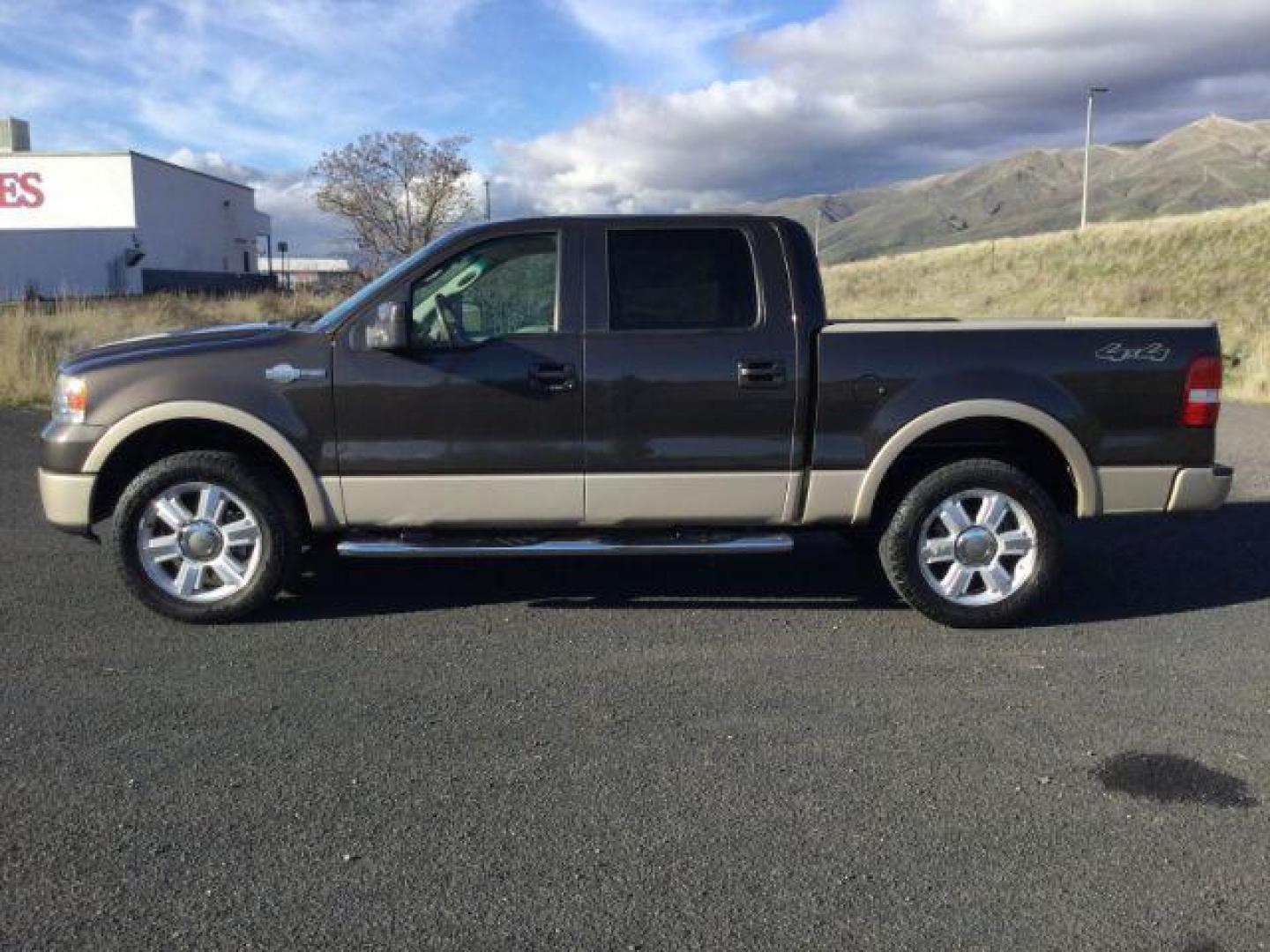 2007 Dark Stone Metallic/Pueblo Gold Metallic /Tan/Castano Brown Leather Interior Ford F-150 Lariat SuperCrew 4WD (1FTPW14V57K) with an 5.4L V8 SOHC 24V FFV engine, 4-Speed Automatic transmission, located at 1801 Main Street, Lewiston, 83501, (208) 743-9371, 46.417065, -117.004799 - Photo#1