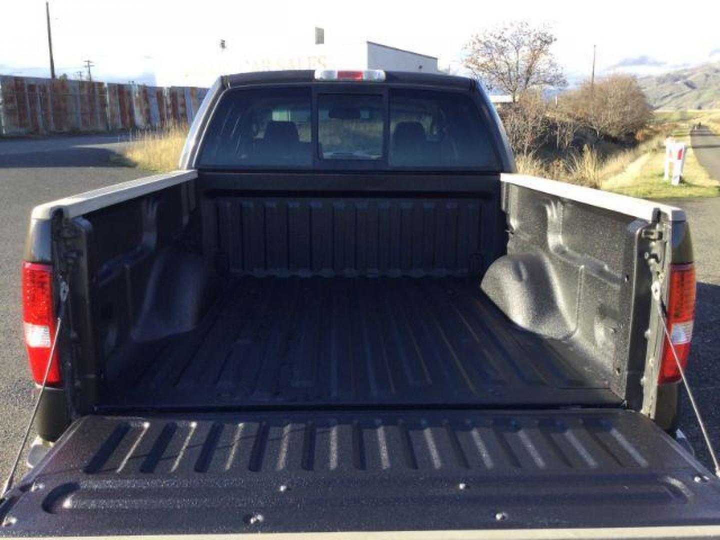 2007 Dark Stone Metallic/Pueblo Gold Metallic /Tan/Castano Brown Leather Interior Ford F-150 Lariat SuperCrew 4WD (1FTPW14V57K) with an 5.4L V8 SOHC 24V FFV engine, 4-Speed Automatic transmission, located at 1801 Main Street, Lewiston, 83501, (208) 743-9371, 46.417065, -117.004799 - Photo#8