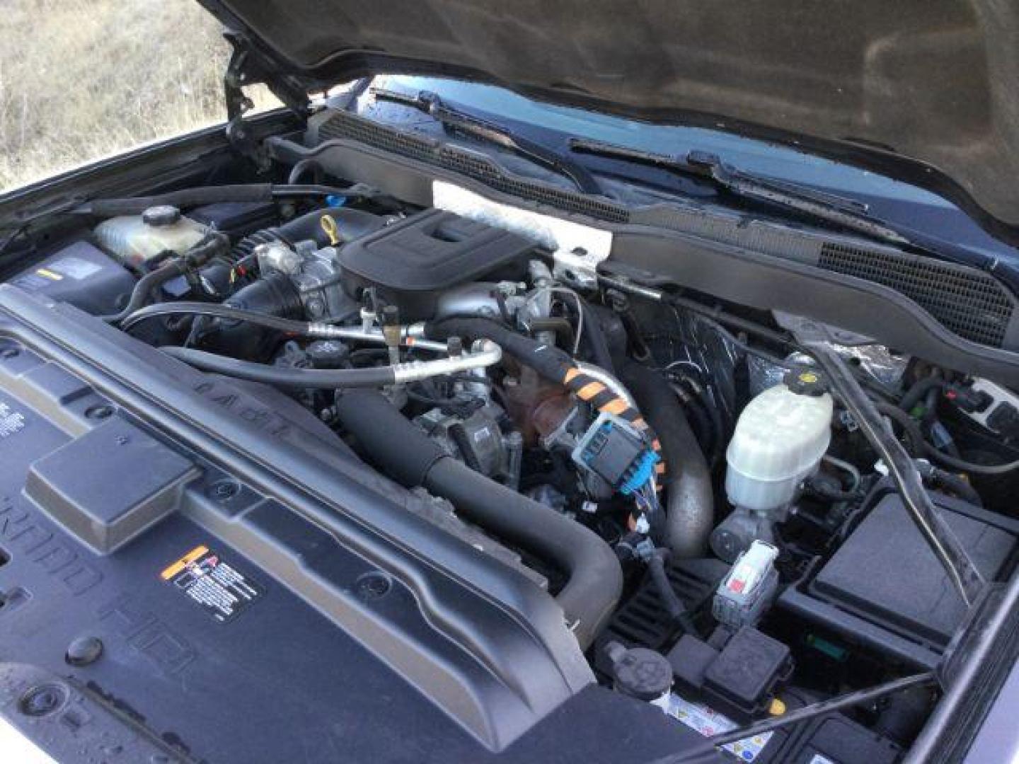 2016 GRAY /JET BLACK CHEVROLET Silverado 3500HD LTZ CREW CAB 4X4 (1GC4K0E85GF) with an 6.6L V8 OHV 32V TURBO DIESEL engine, 6-SPEED AUTOMATIC transmission, located at 1801 Main Street, Lewiston, 83501, (208) 743-9371, 46.417065, -117.004799 - Photo#19