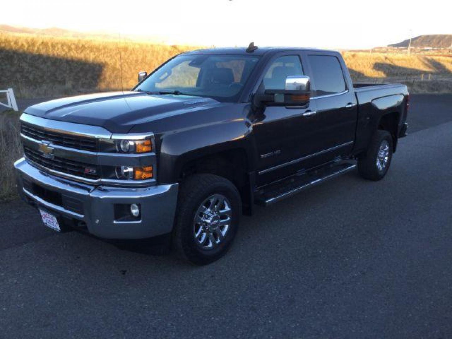 2016 GRAY /JET BLACK CHEVROLET Silverado 3500HD LTZ CREW CAB 4X4 (1GC4K0E85GF) with an 6.6L V8 OHV 32V TURBO DIESEL engine, 6-SPEED AUTOMATIC transmission, located at 1801 Main Street, Lewiston, 83501, (208) 743-9371, 46.417065, -117.004799 - Photo#26