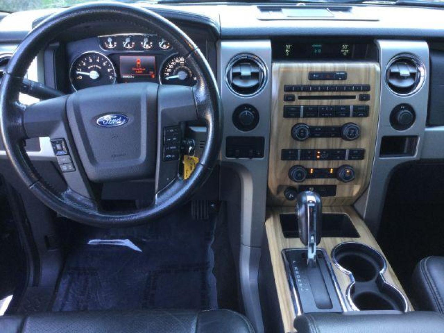 2011 Blue/Gold /Black Leather Interior Ford F-150 Lariat SuperCrew 5.5-ft. Bed 4WD (1FTFW1EF3BF) with an 5.0L V8 engine, 6-SPEED AUTOMATIC transmission, located at 1801 Main Street, Lewiston, 83501, (208) 743-9371, 46.417065, -117.004799 - Photo#5