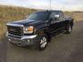 2016 Onyx Black /Jet Black, leather GMC Sierra 3500HD SLT Crew Cab 4WD (1GT42XE82GF) with an 6.6L V8 OHV 16 DIESEL engine, 6-Speed Automatic transmission, located at 1801 Main Street, Lewiston, 83501, (208) 743-9371, 46.417065, -117.004799 - Photo#0