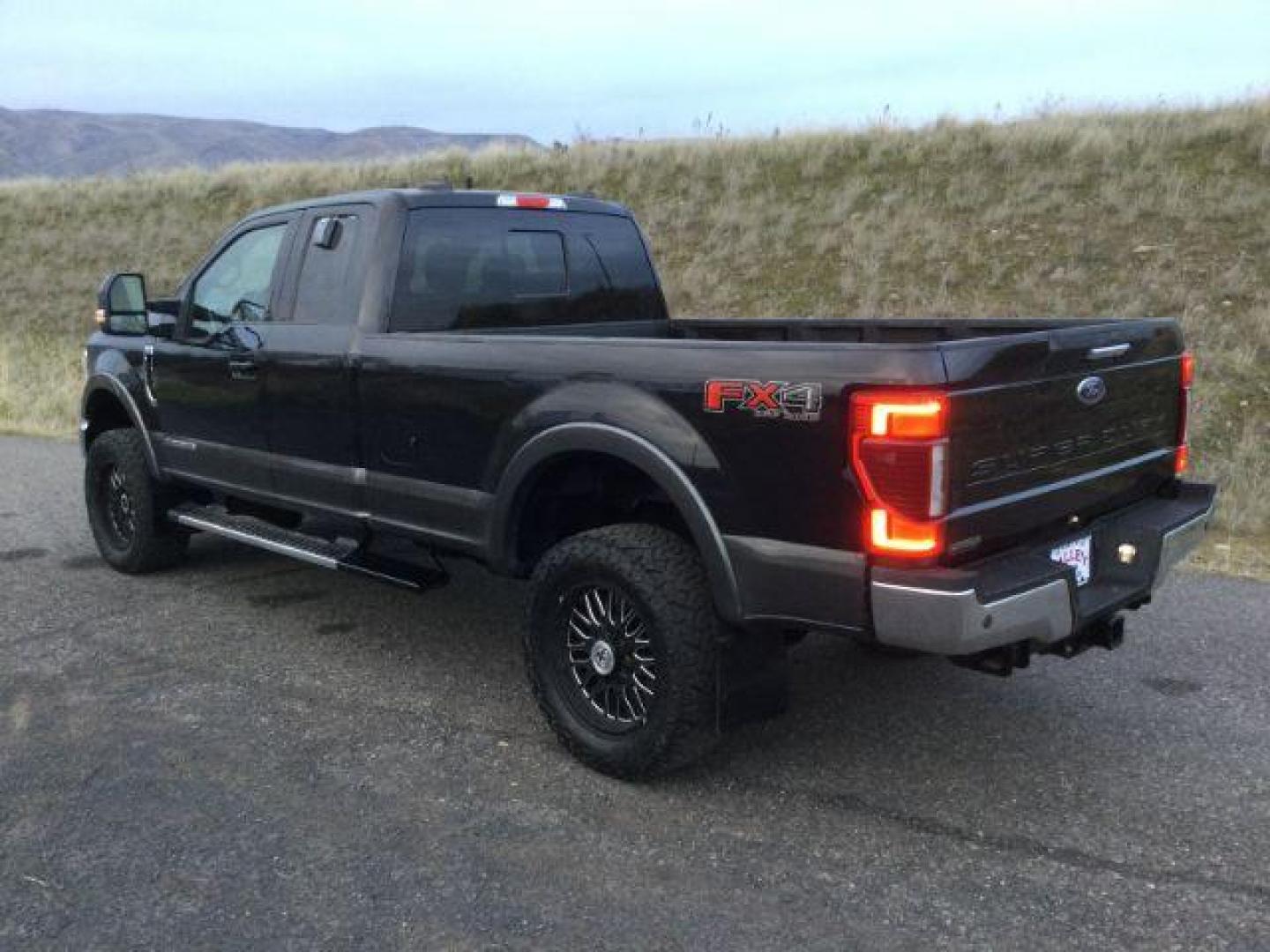 2020 Agate Black/Magnetic Metallic /Black, leather Ford F-350 SD Lariat SuperCab Long Bed 4WD (1FT8X3BT4LE) with an 6.7L V8 OHV 16V DIESEL engine, 10-speed automatic transmission, located at 1801 Main Street, Lewiston, 83501, (208) 743-9371, 46.417065, -117.004799 - Photo#2