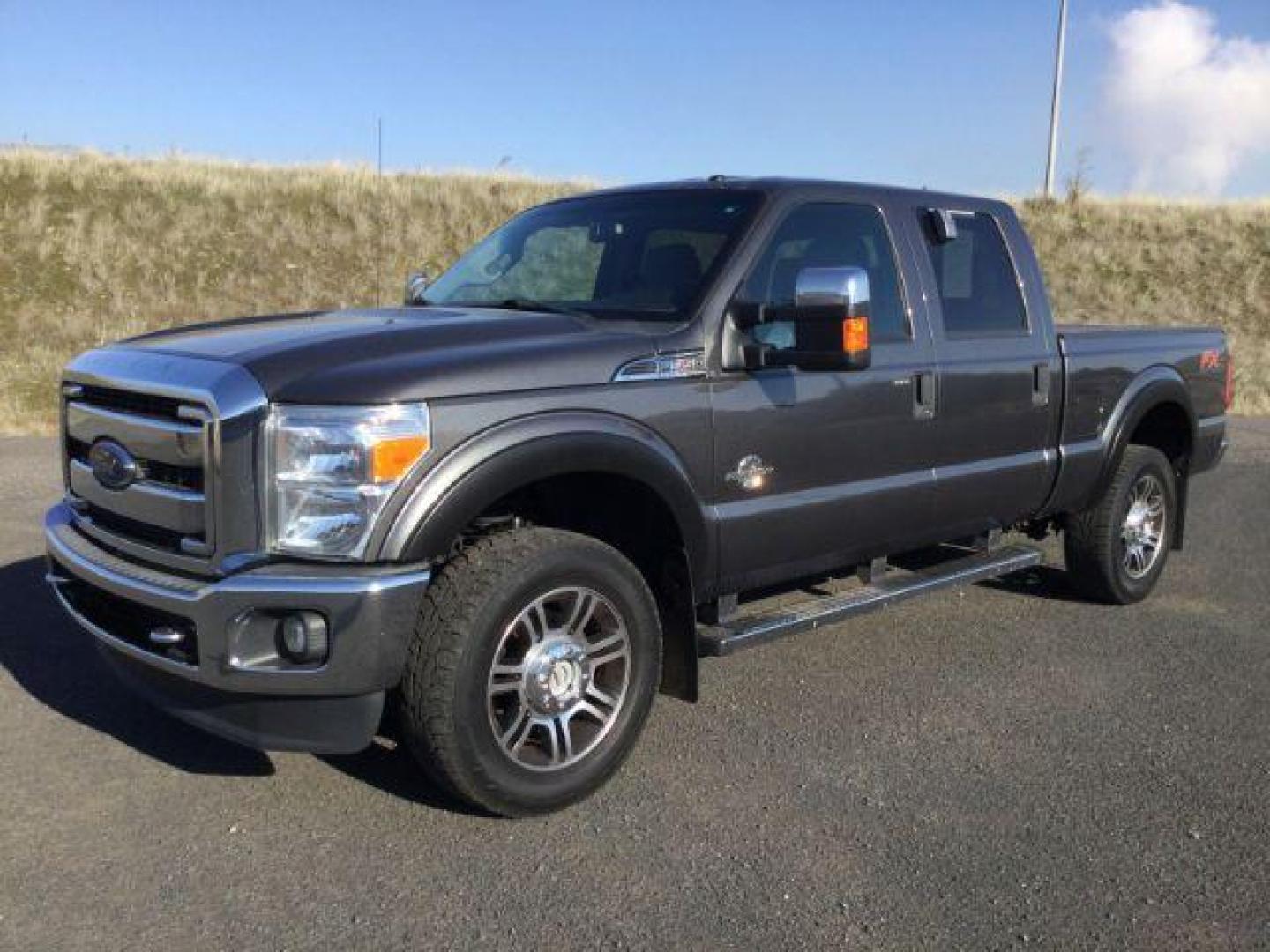 2015 Magnetic Metallic /Steel Ford F-350 SD XLT Crew Cab 4WD (1FT8W3BT3FE) with an 6.7L V8 OHV 16V DIESEL engine, 6-Speed Automatic transmission, located at 1801 Main Street, Lewiston, 83501, (208) 743-9371, 46.417065, -117.004799 - Photo#0