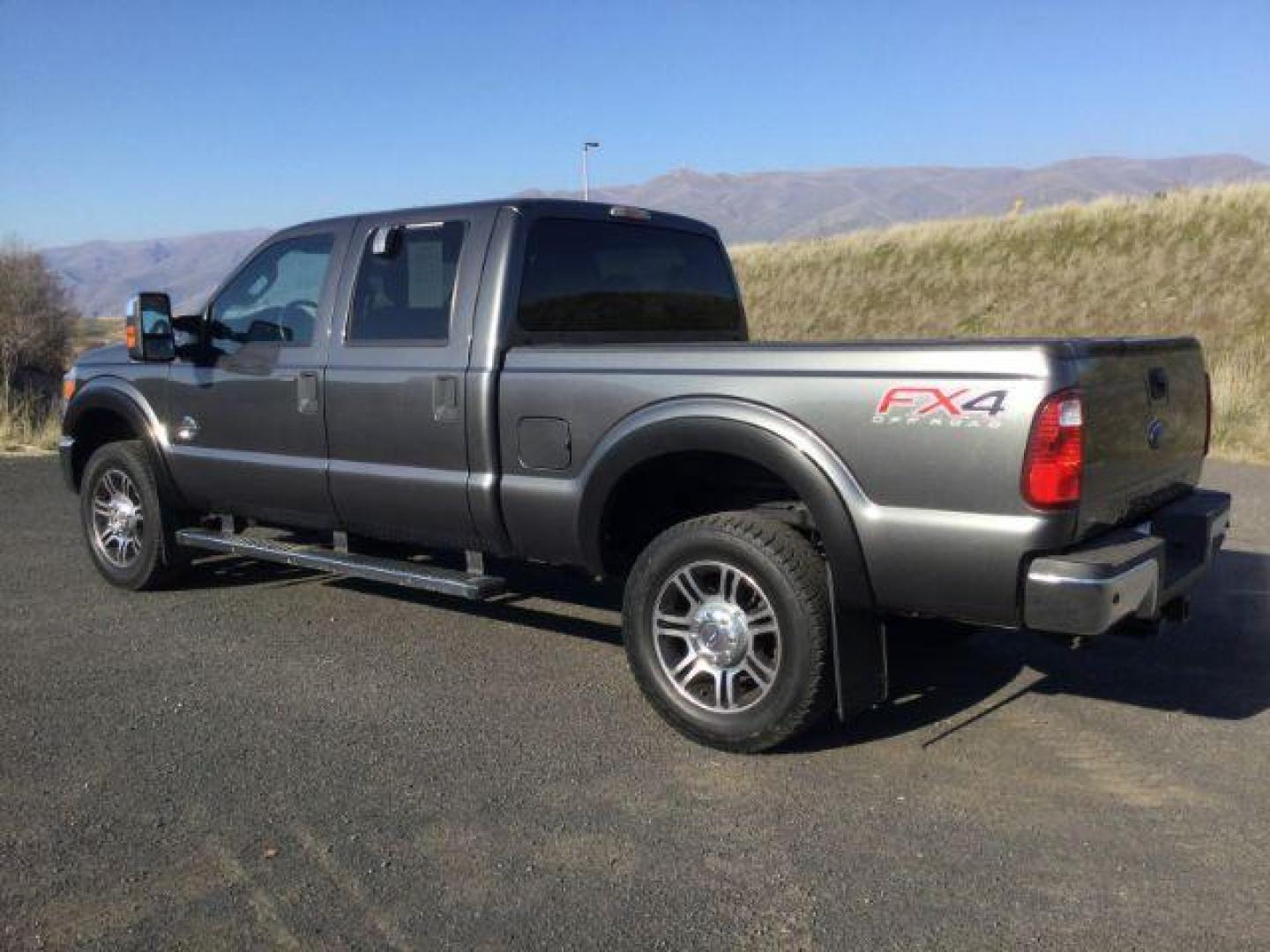 2015 Magnetic Metallic /Steel Ford F-350 SD XLT Crew Cab 4WD (1FT8W3BT3FE) with an 6.7L V8 OHV 16V DIESEL engine, 6-Speed Automatic transmission, located at 1801 Main Street, Lewiston, 83501, (208) 743-9371, 46.417065, -117.004799 - Photo#2